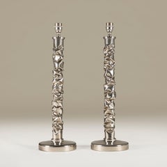 Pair of tall 'melting metal' polished nickel lamps by Porta Romana, 2010