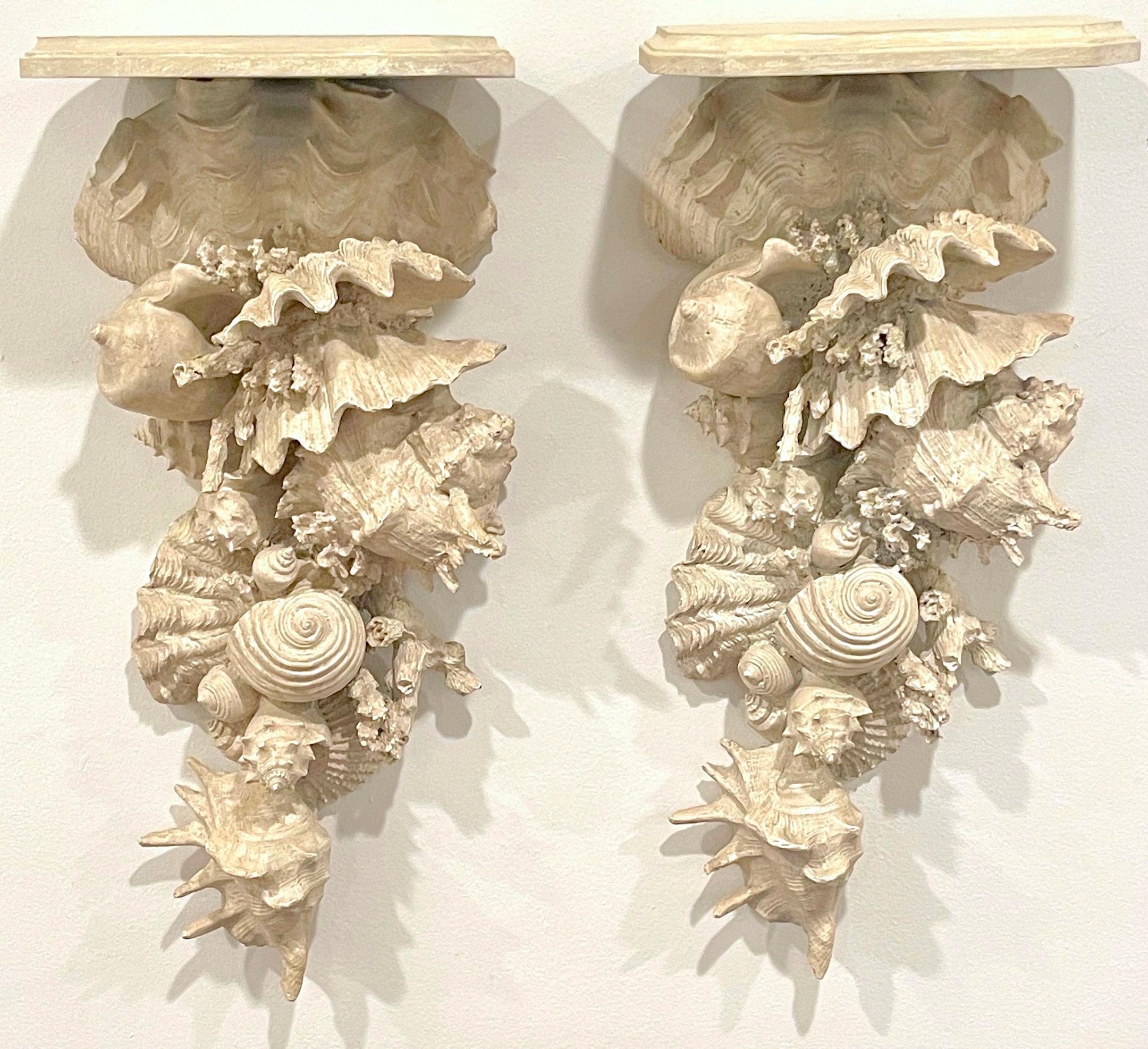Pair of Tall 'Narragansett' Shell & Coral Motif  Wall Brackets 
Later 20th Century 
Enhance your wall decor with this charming Pair of Tall 'Narragansett' Shell & Coral Motif Wall Brackets, made in the later 20th century. These brackets combine