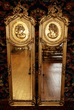 Pair of Tall Narrow Louis XV French Style Gold Figural Beveled Glass Mirrors