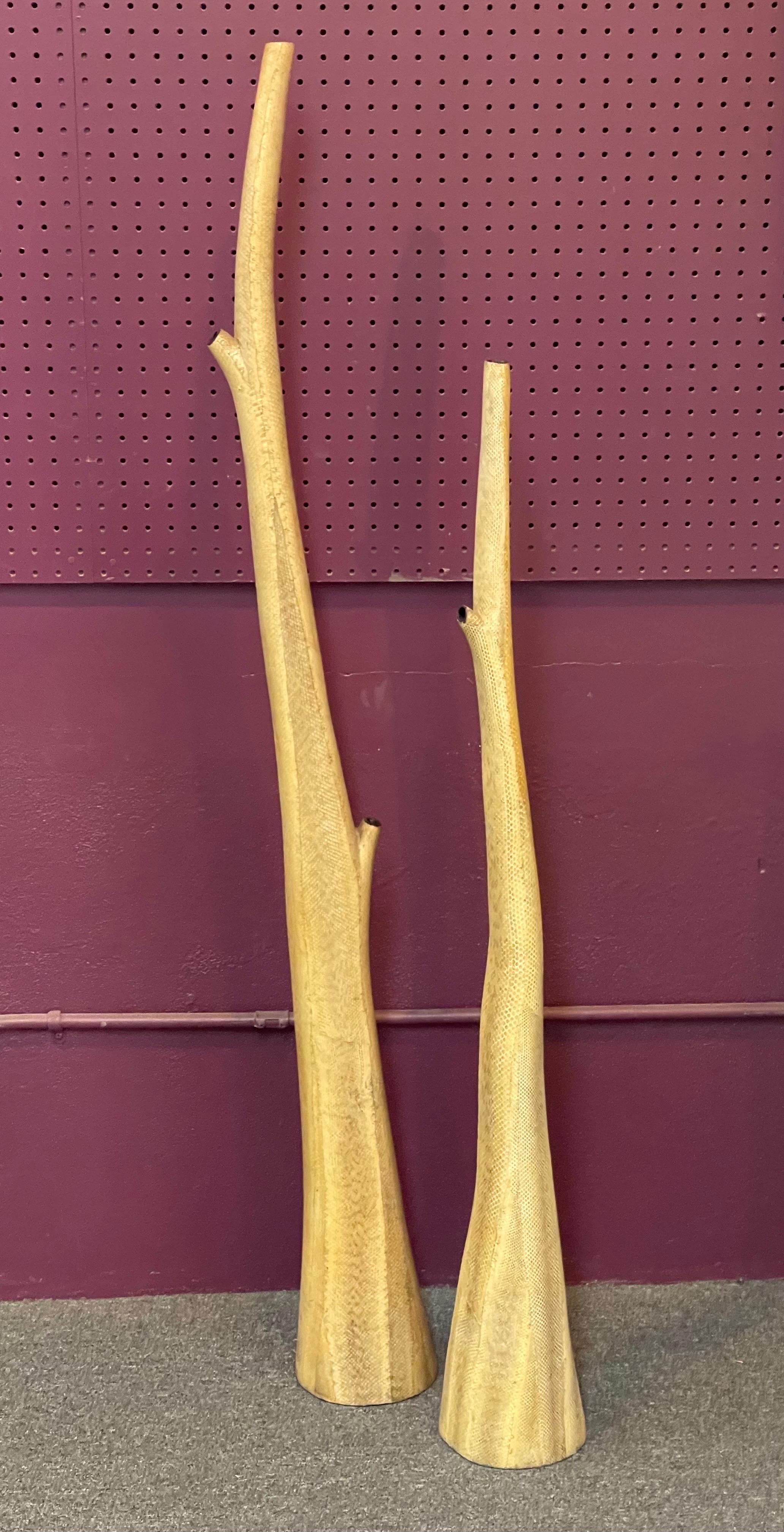 Incredible pair of tall organic shaped snakeskin clad floor vases in the style of R Y Augousti, circa 1990s. The vases are in very good vintage condition and measure 6.5