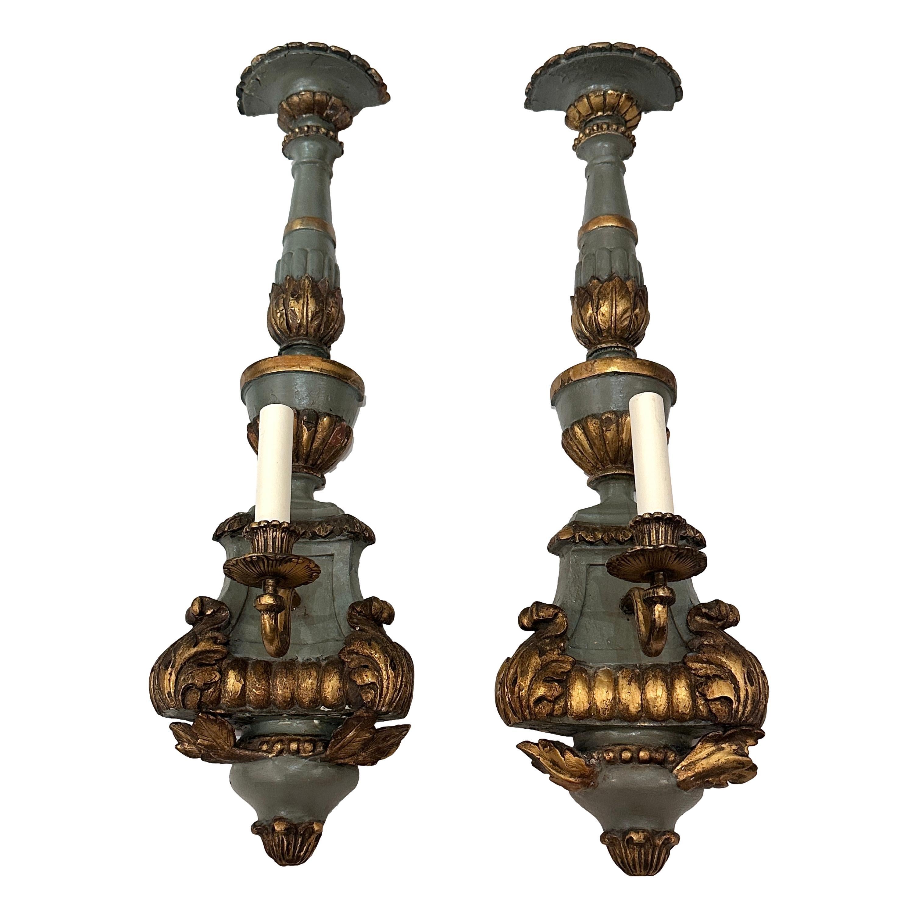 Pair of large single-light carved wood 19th Century Venetian sconces with original painted finish and gilt details.

Measurements:
Height: 30
