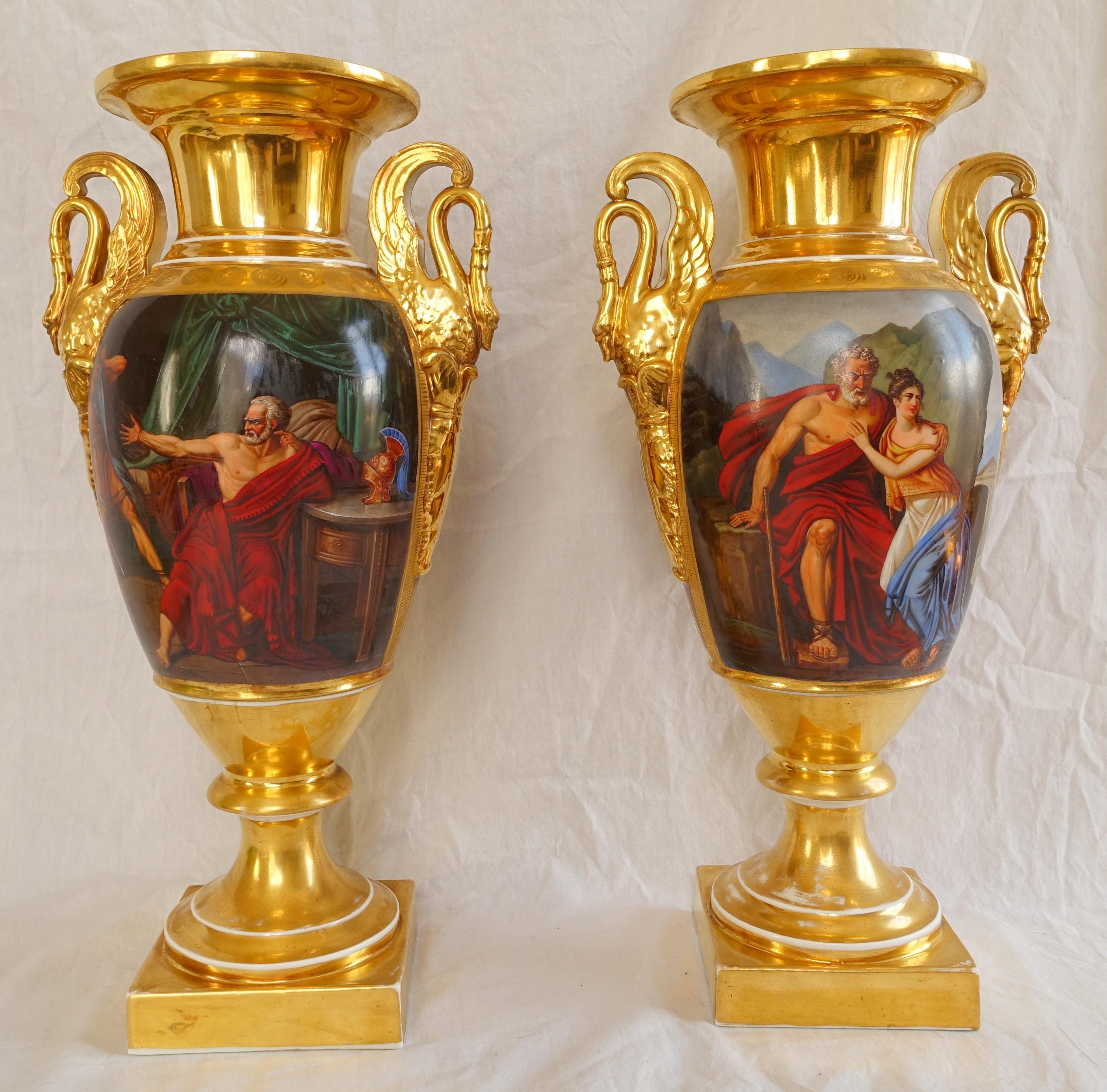 An antique pair of Paris porcelain vases in the taste of Darte manufacture, early 19th century high-end French production circa 1810 - 1815 (Empire period).
Spectacular, fully decorated model, a polychromatic hand-painted mythological scene on one