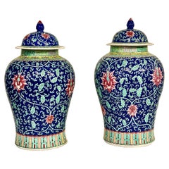 Pair of Tall Pink and Blue Chinese Lidded Jars