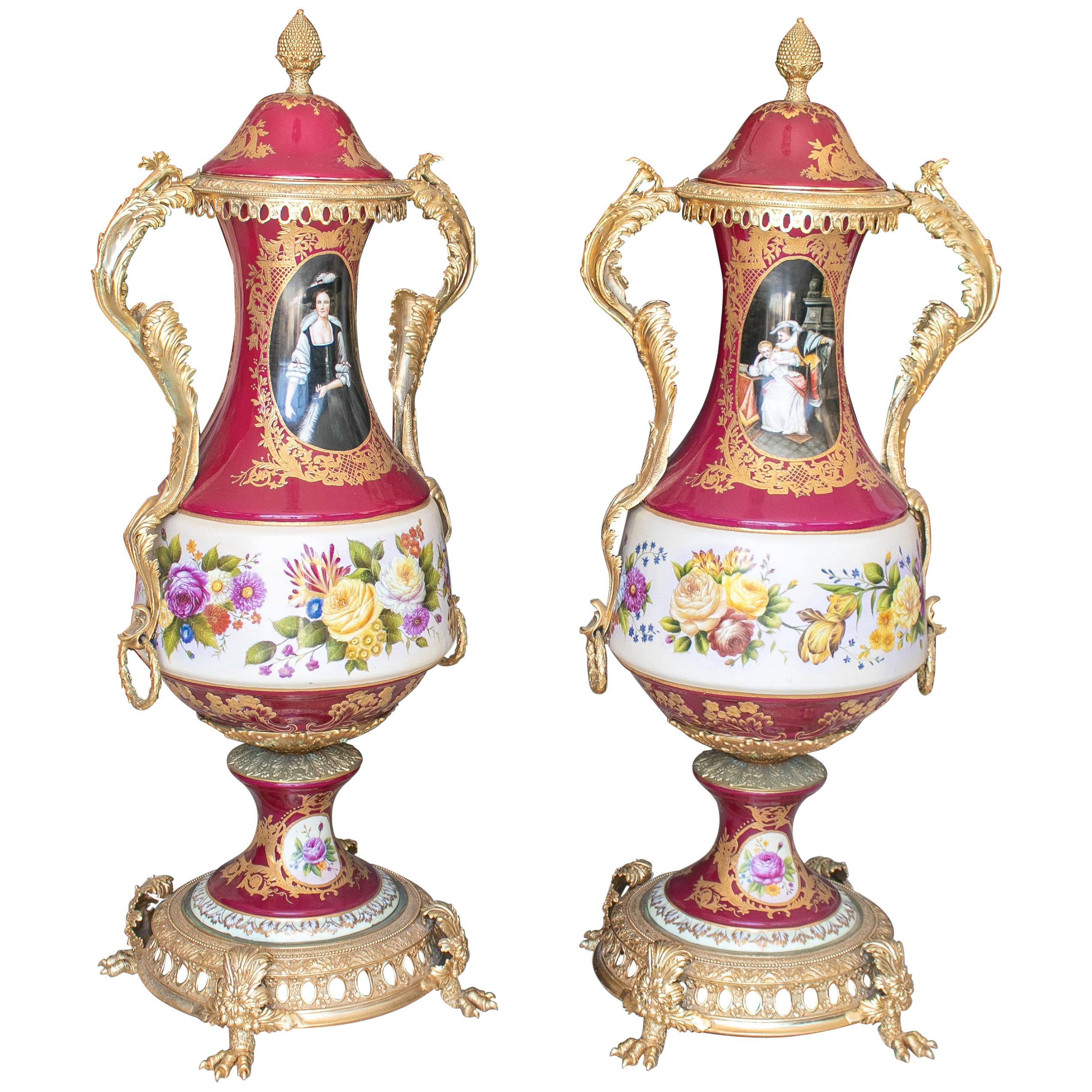 Pair of Tall Porcelain Urns Hand Painted with Costumbrist Scenes For Sale