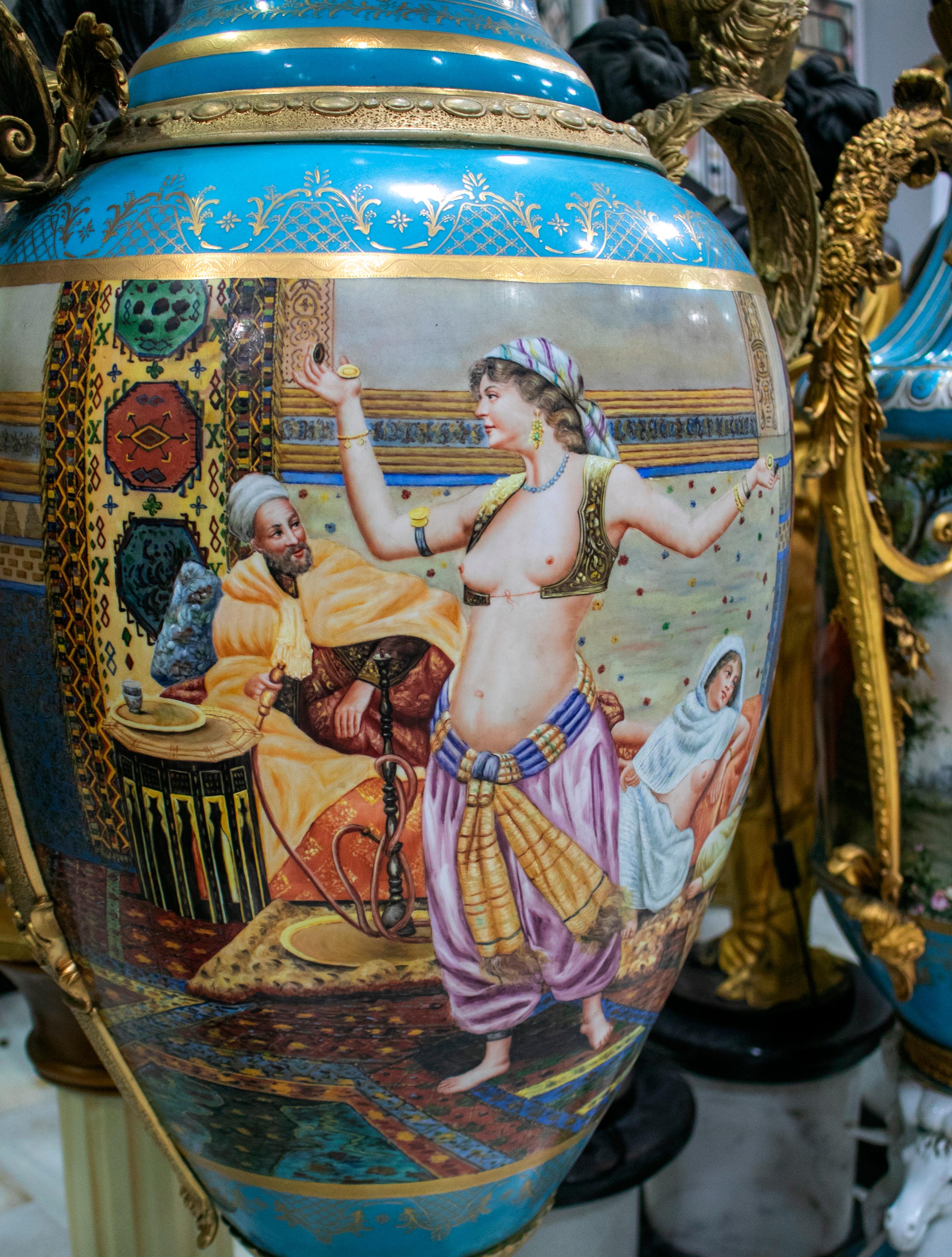 Pair of Tall Porcelain Urns Hand Painted with Orientalist Harem Scenes For Sale 2