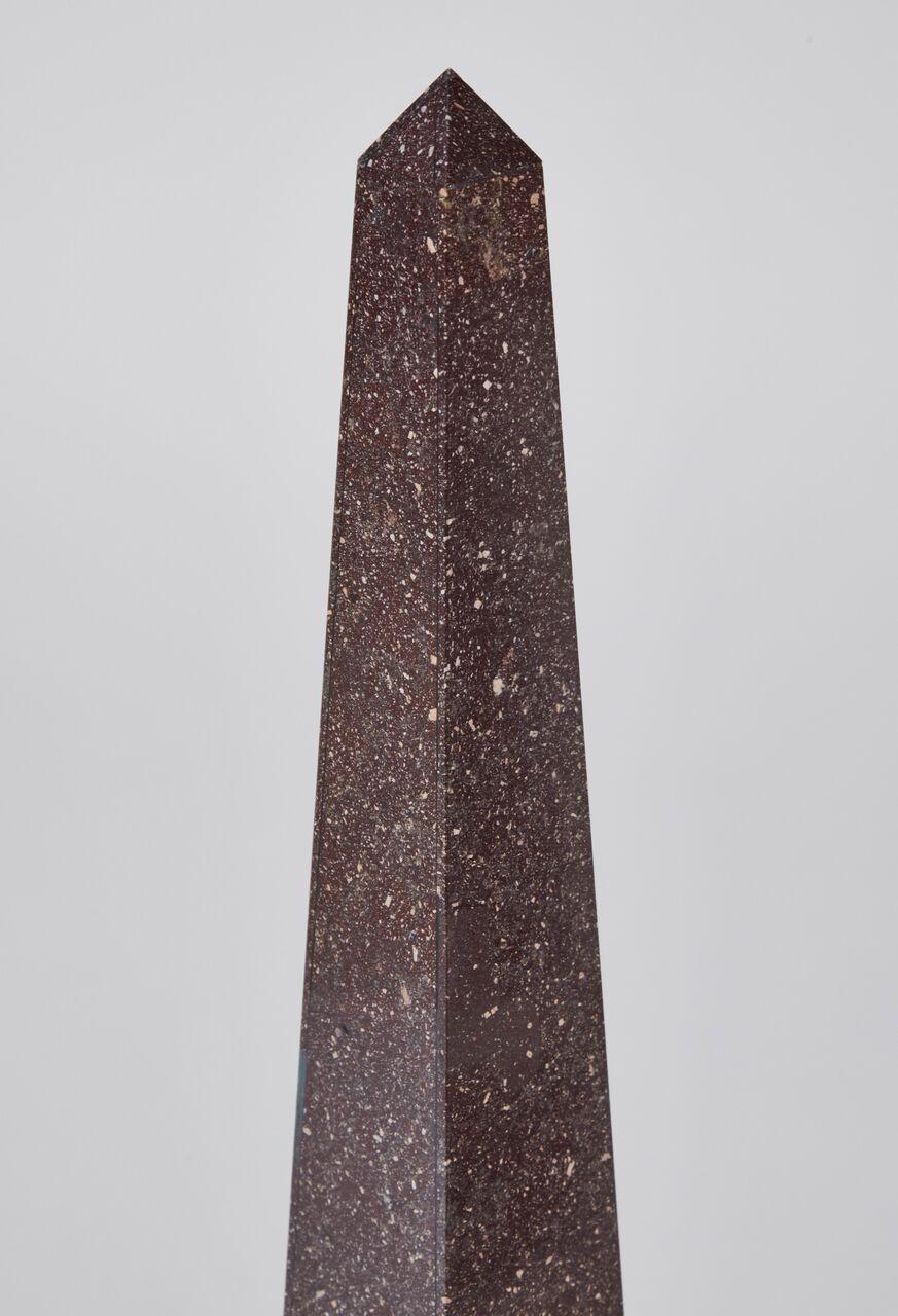 Pair of porphyry veneered and marble obelisks. Lovely pair in wonderful condition to complement any decor.