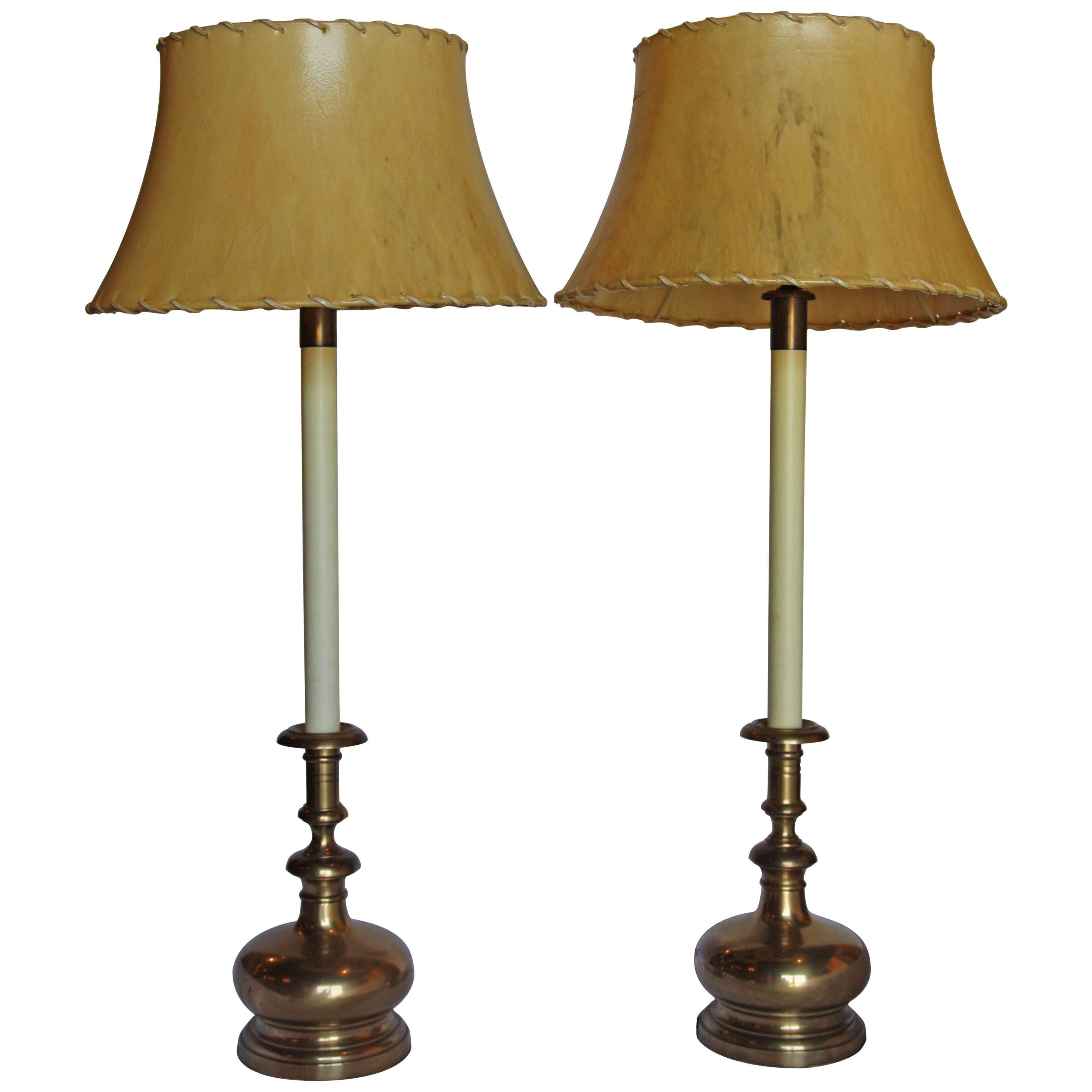 Pair of Tall Stiffel Brass Candlestick Lamps with Handstitched Rawhide Shades For Sale