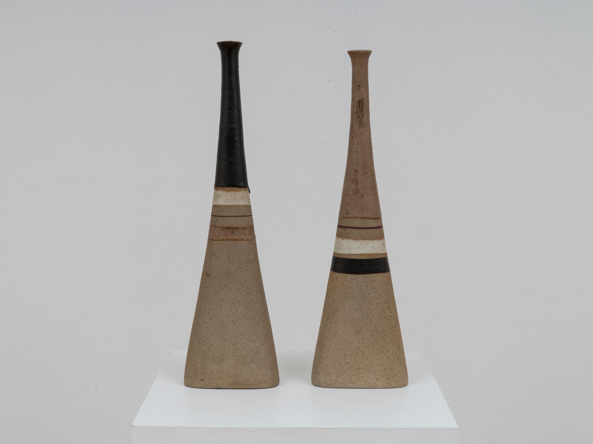 Pair of important Gambone vases, featuring a very recognizable striiped decor that has become iconic in the ceramic master's production. These pieces, with an apperance that misteriouly can be at the same time modern and ancient, stand as timeless