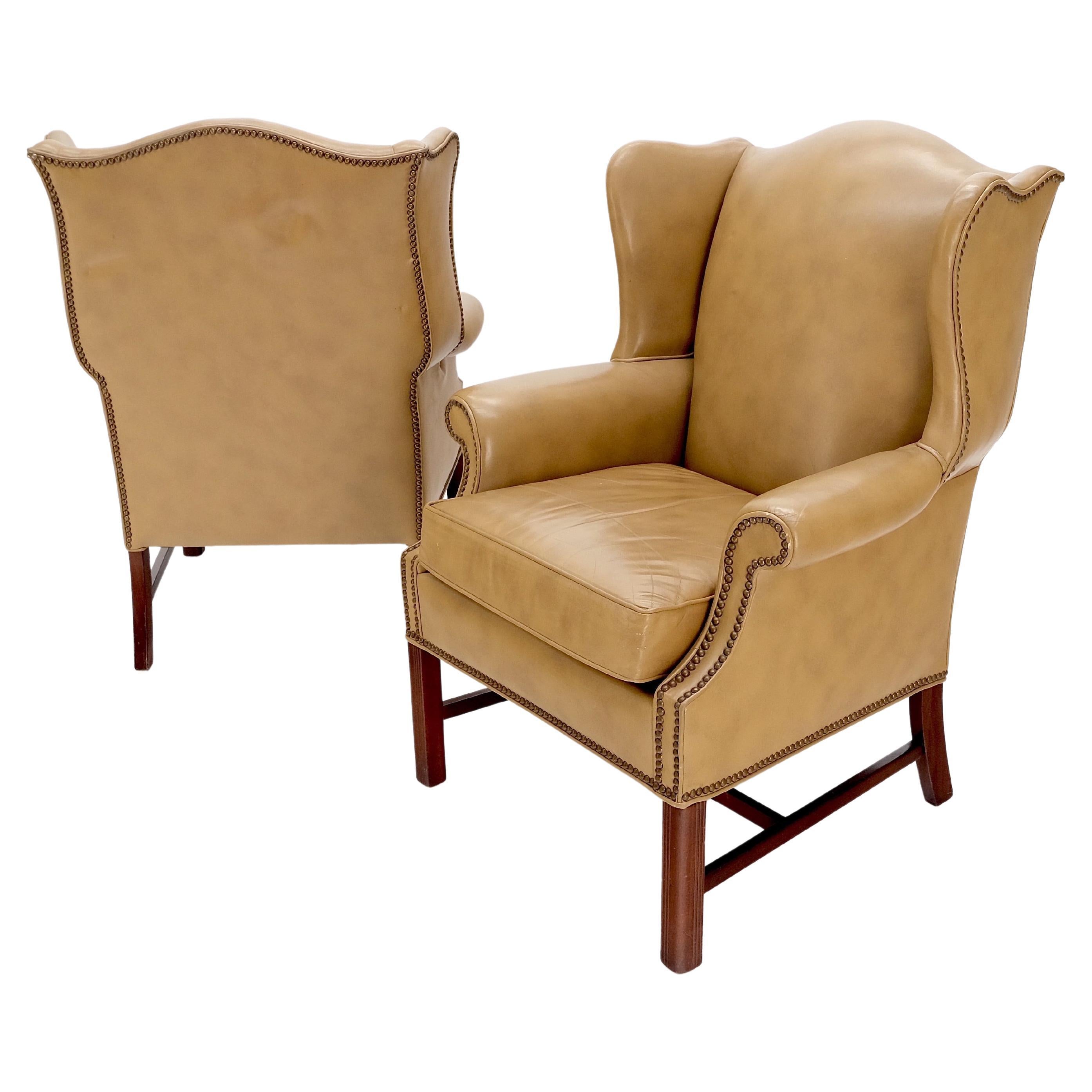 Pair of Tall Tan Leather Wing Chairs on Solid Mahogany Stretcher Base Mint! For Sale