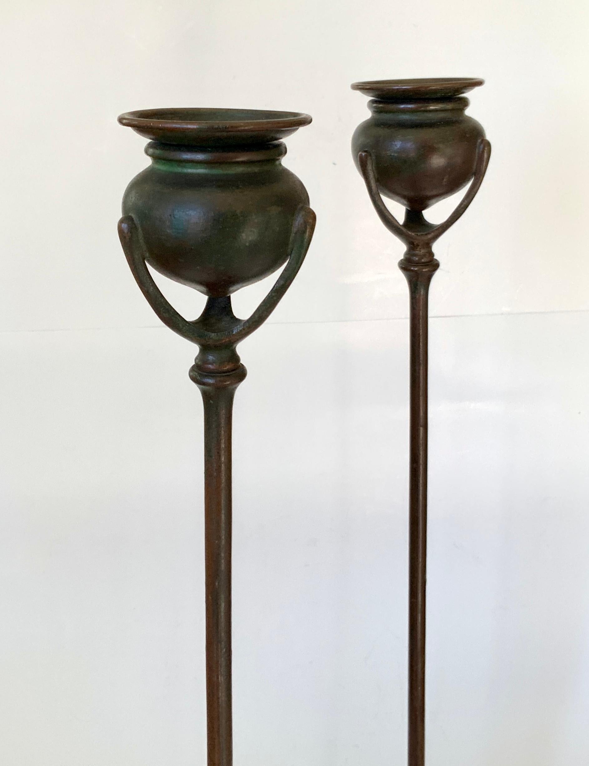 Hand-Crafted Pair of Tall Tiffany Studios Bronze Candlesticks, Early 1900's For Sale