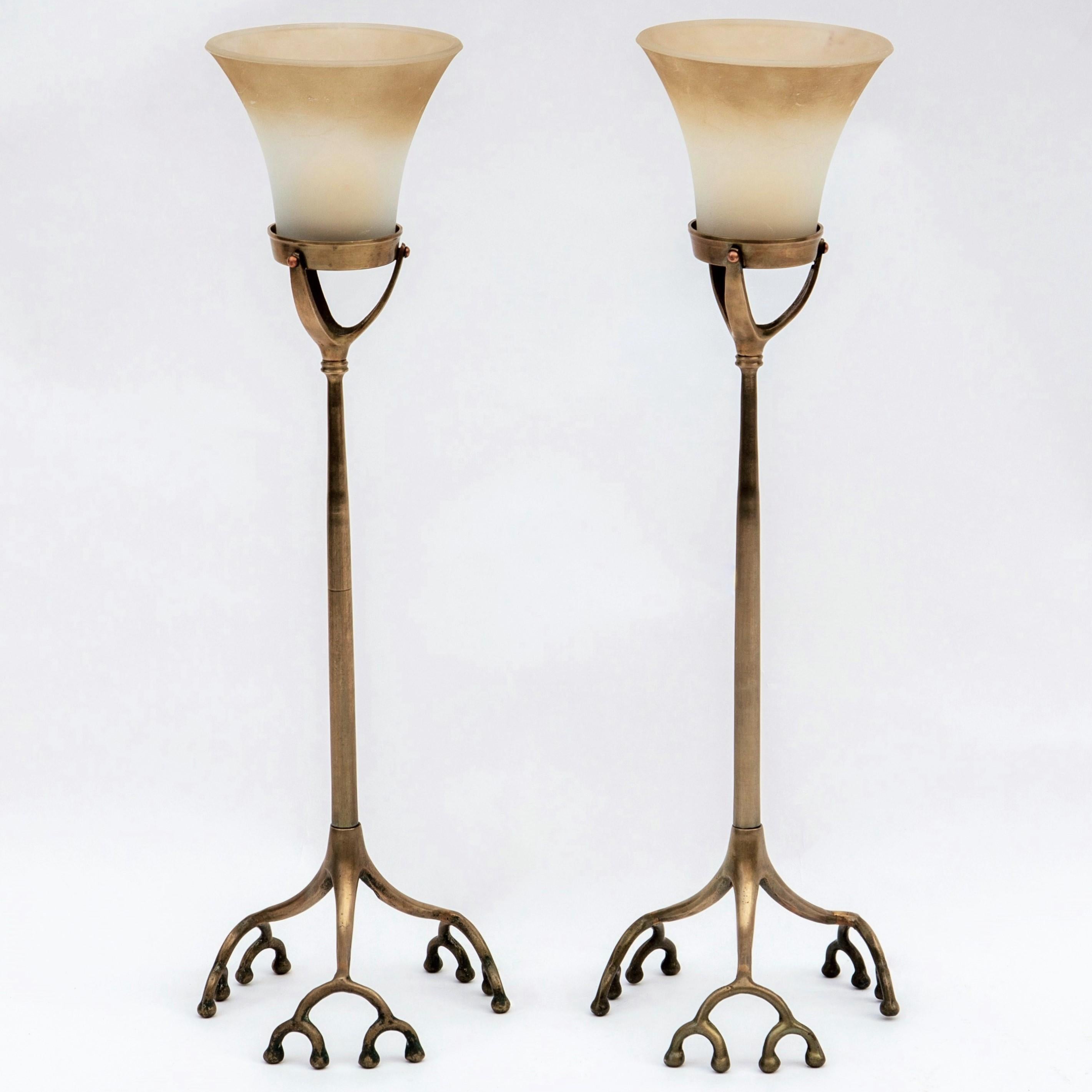 A pair of tall, solid brass, root form candleholders with a light bronze patina. They are replicas of the Tiffany Studios New York, 
