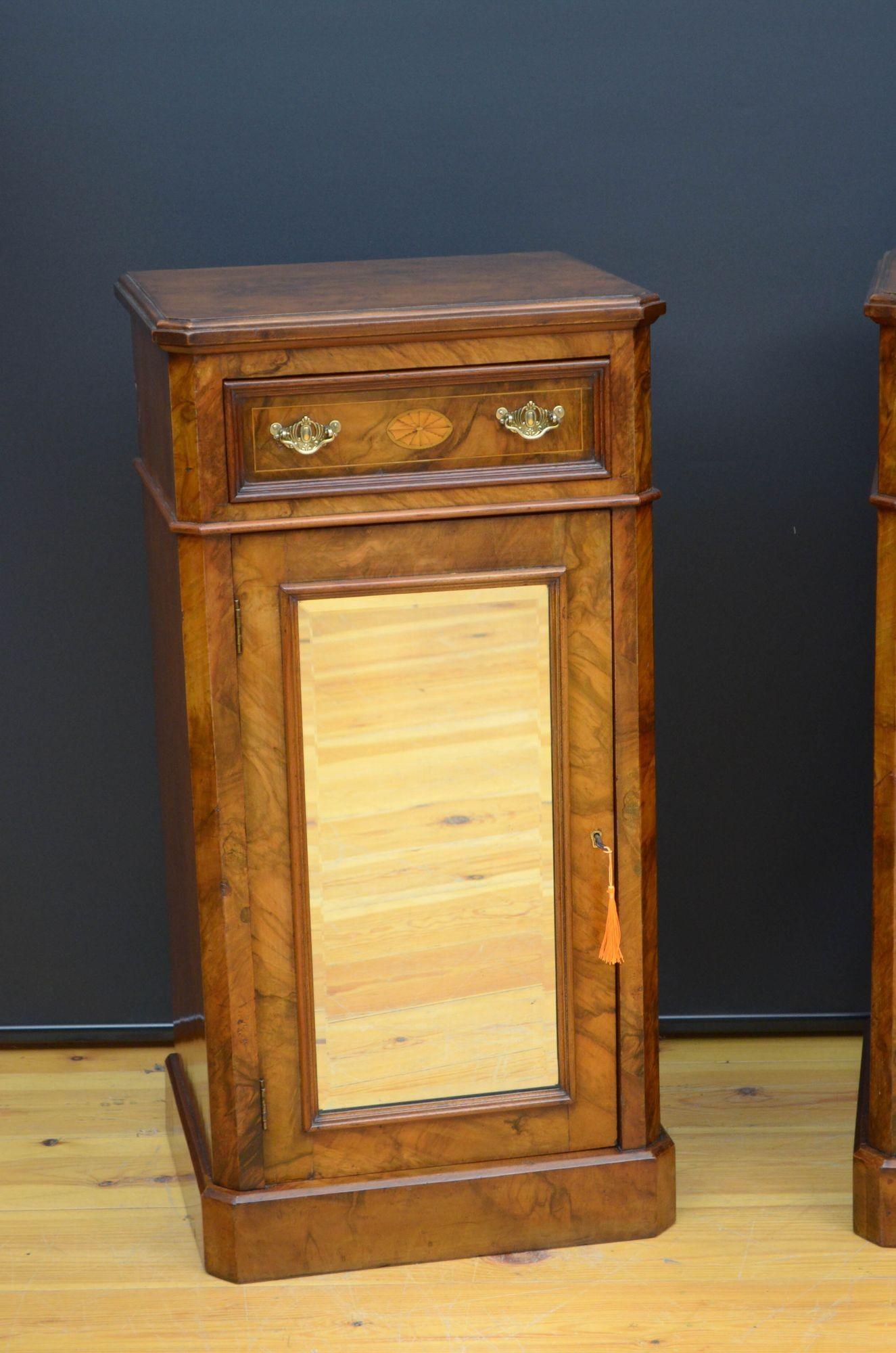 Sn5485 Pair of Victorian walnut pedestal or bedside cabinets, each having burr walnut top with moulded edge above satinwood inlaid drawer fitted with original brass handles, and cabinet door with original bevelled edge mirror, original working lock