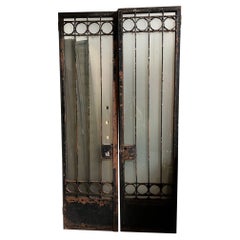 Pair of Tall Vintage Iron Doors with Frosted Glass