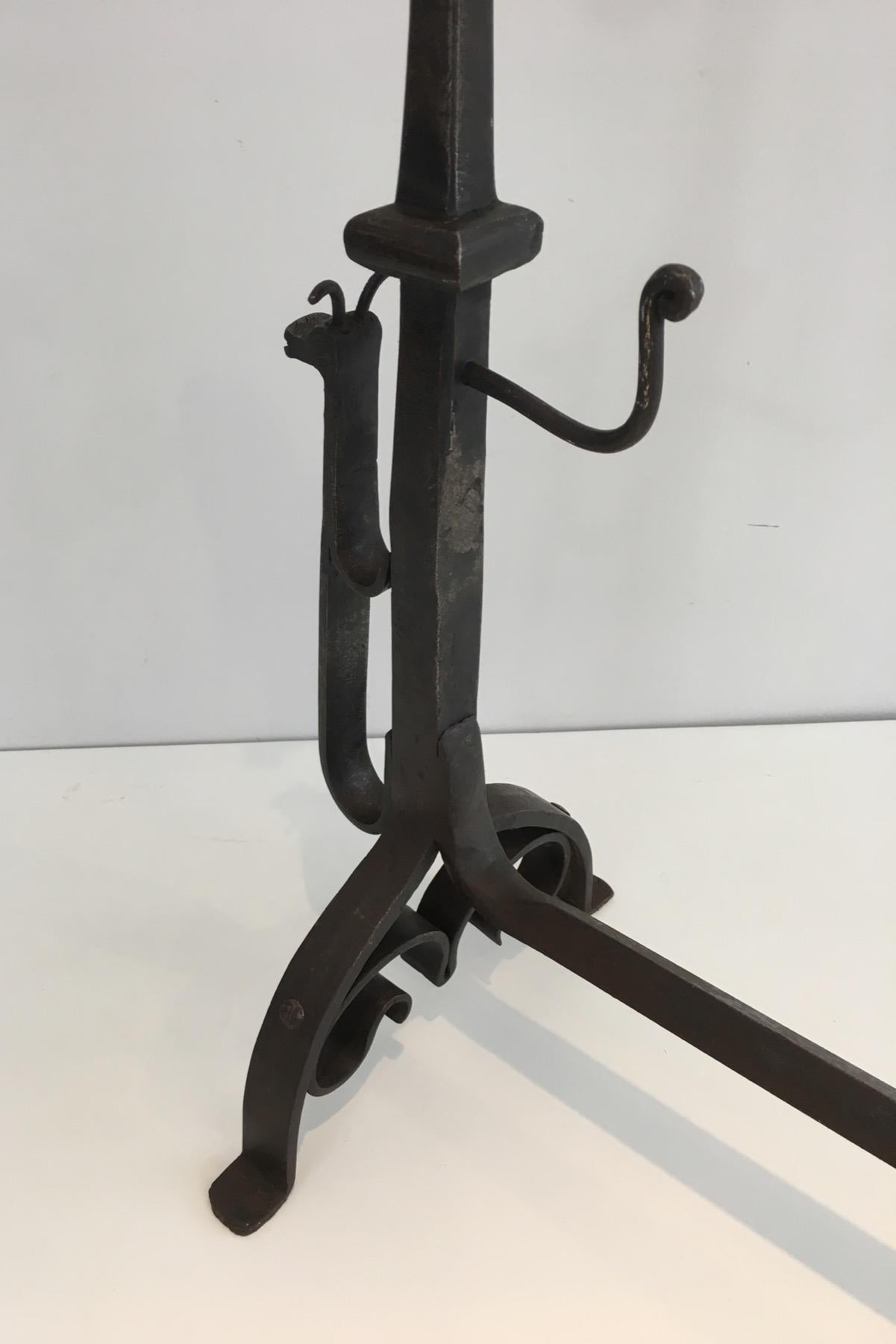 Pair of Tall Wrought Iron Andirons showing a Snail For Sale 7