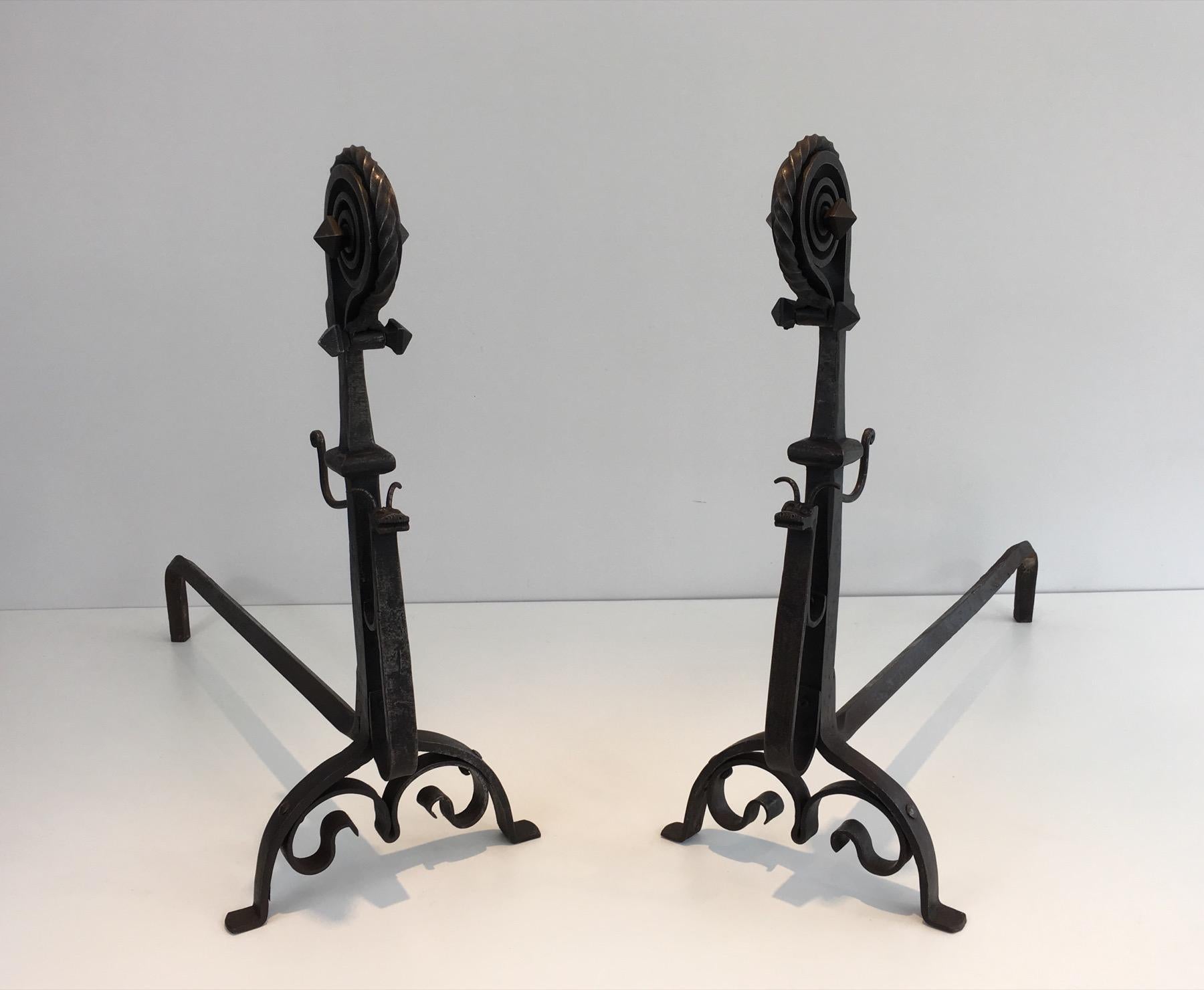 Mid-Century Modern Pair of Tall Wrought Iron Andirons showing a Snail For Sale