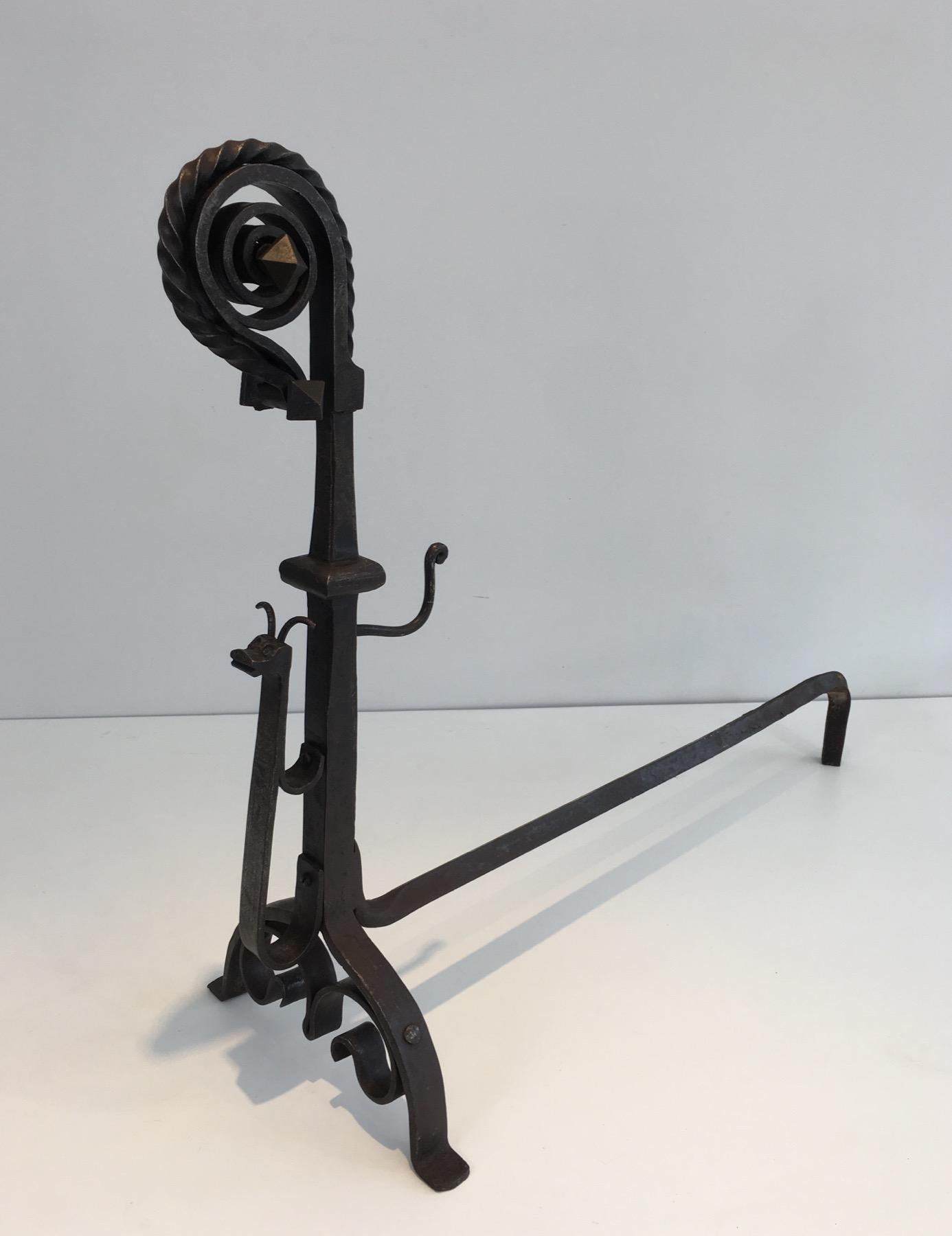 Early 20th Century Pair of Tall Wrought Iron Andirons showing a Snail For Sale