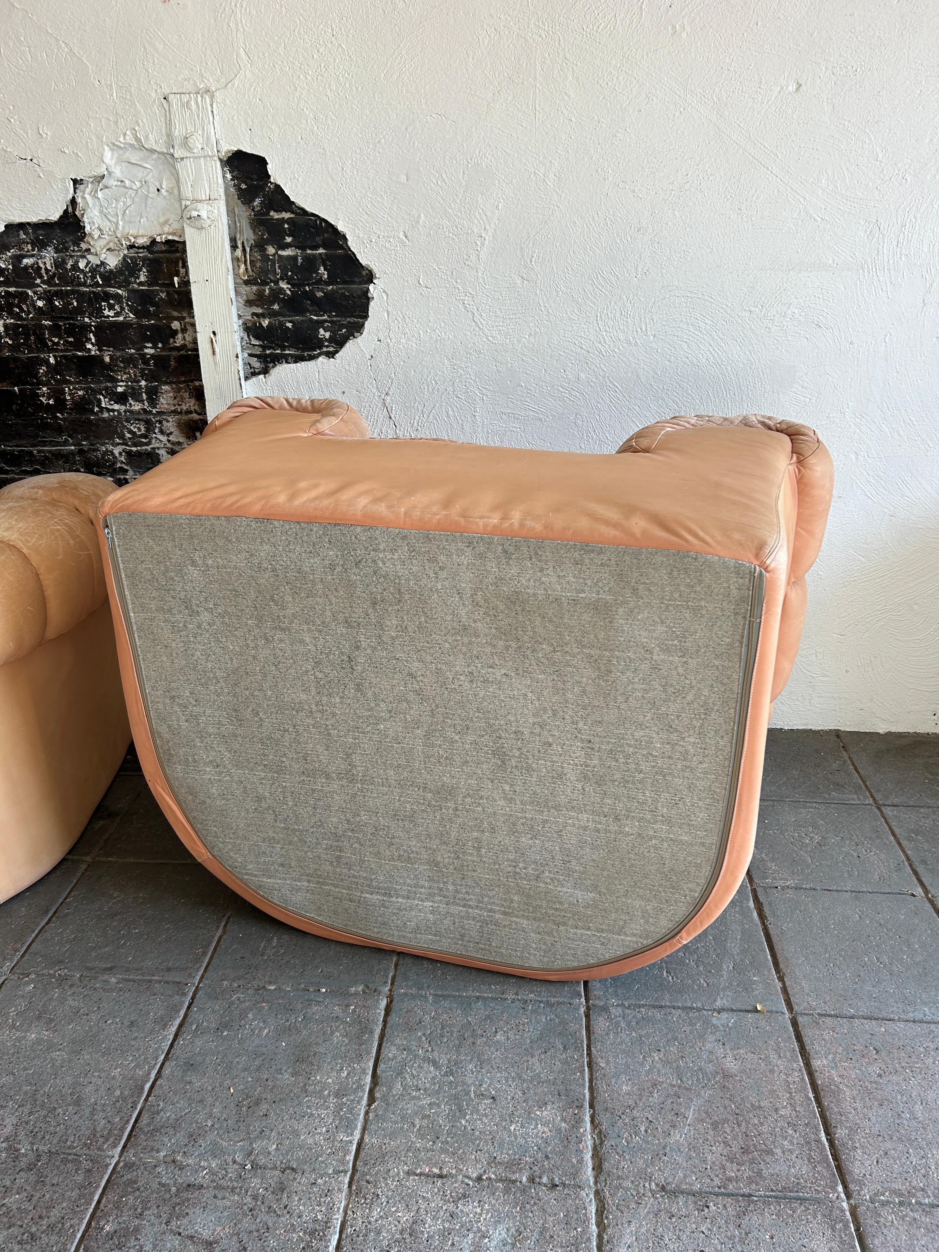 Pair of tan leather Dutch croissant puffy low lounge chairs 4