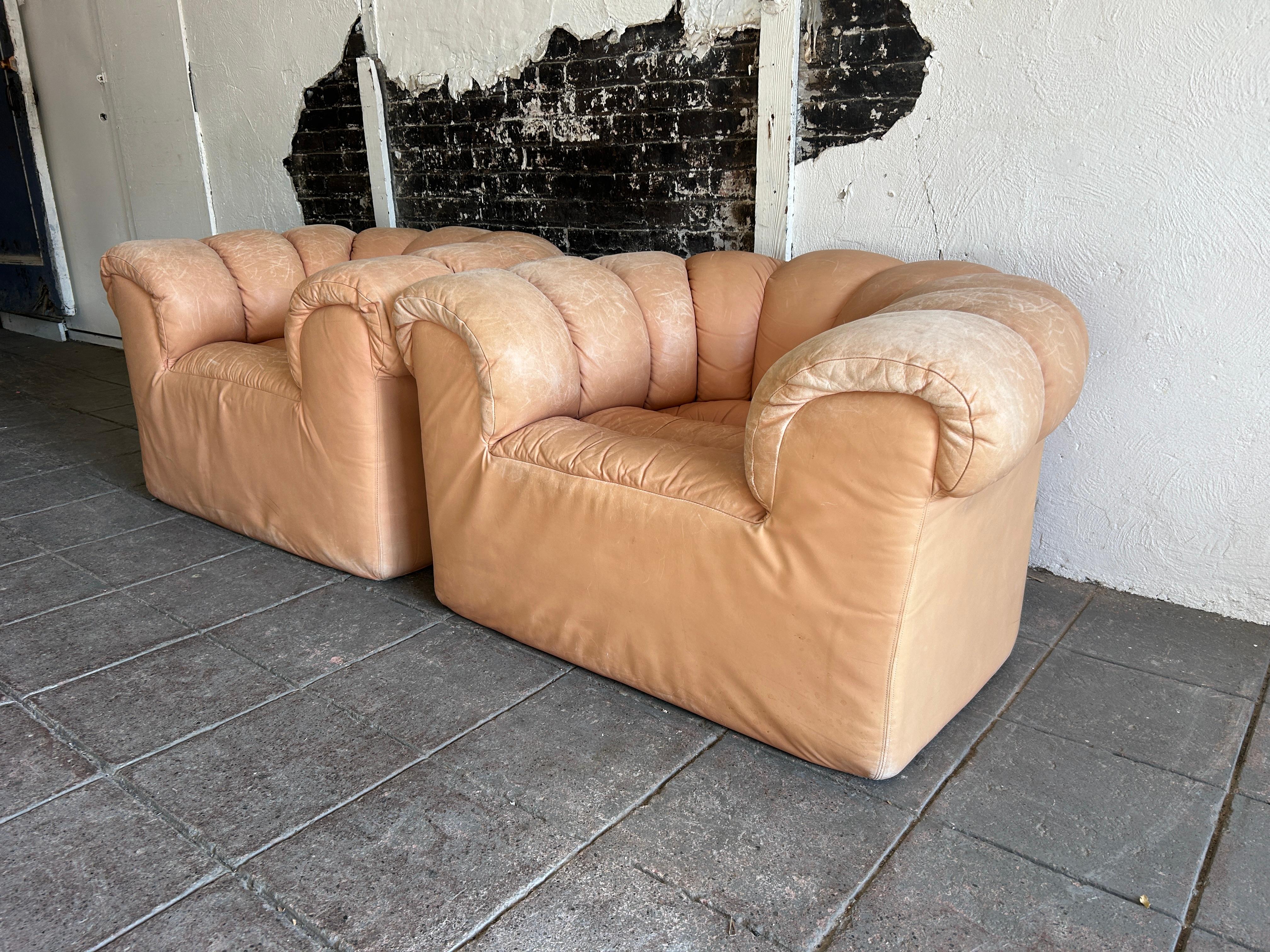 Post-Modern Pair of tan leather Dutch croissant puffy low lounge chairs