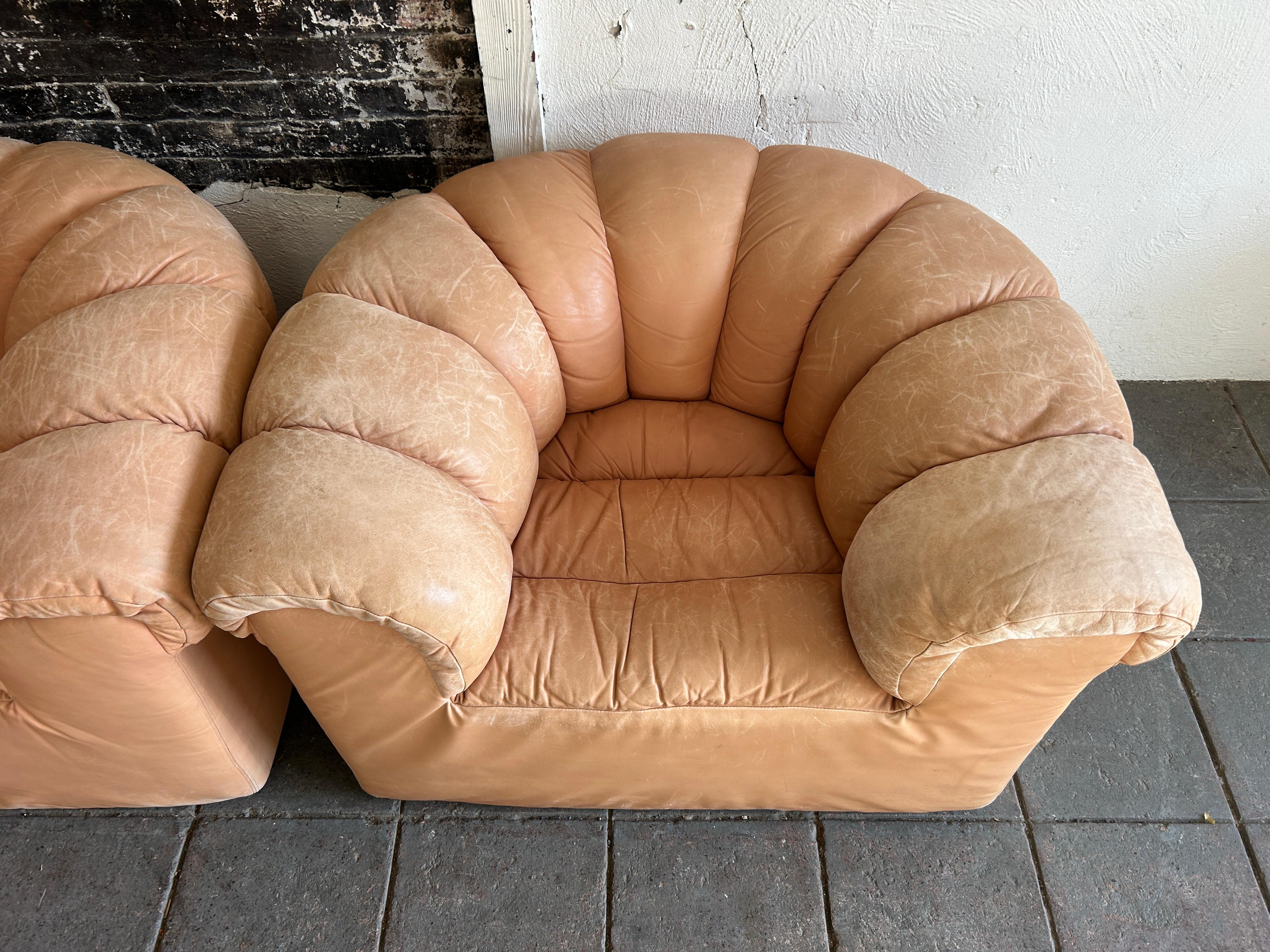 Late 20th Century Pair of tan leather Dutch croissant puffy low lounge chairs