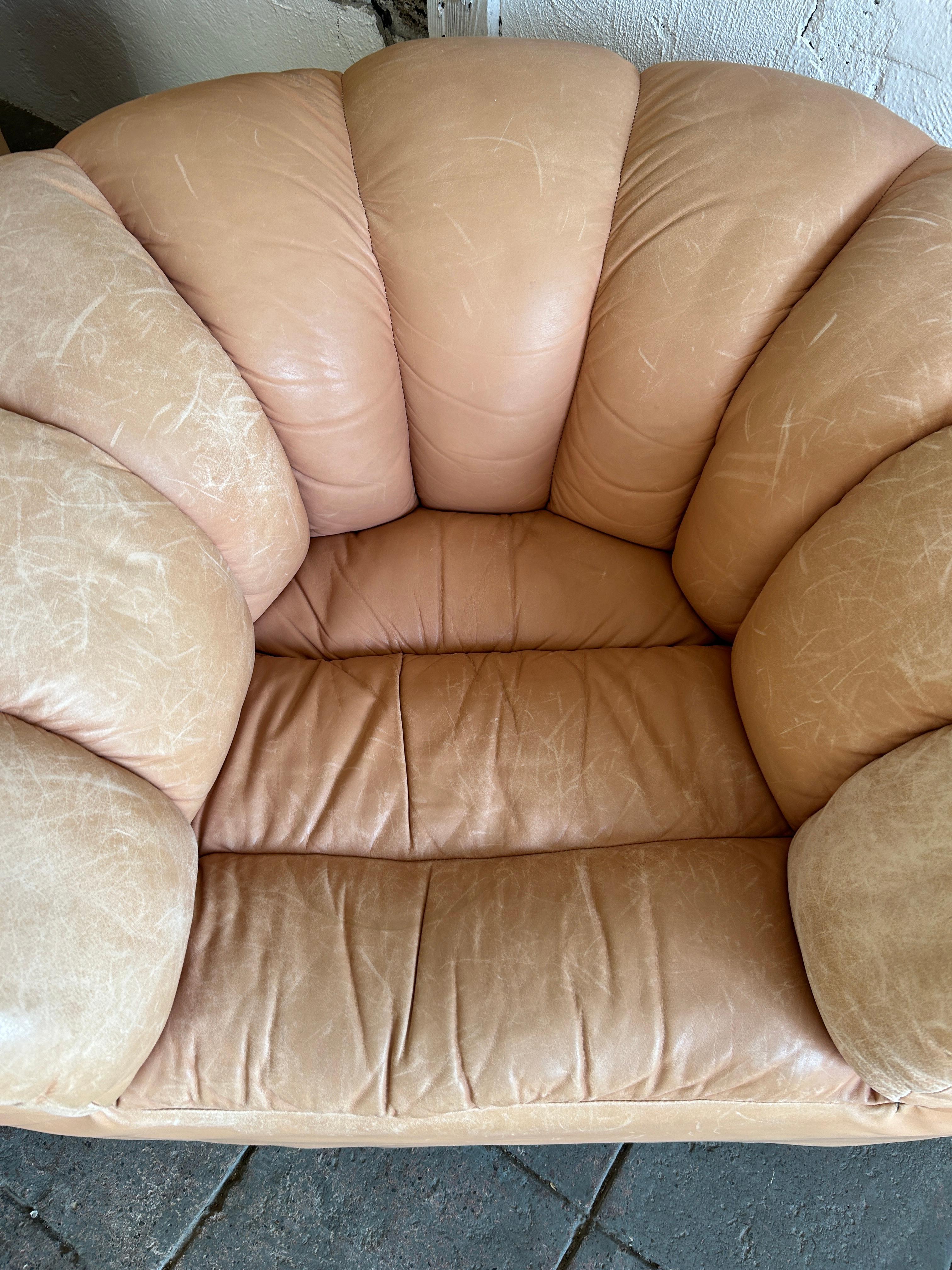 Pair of tan leather Dutch croissant puffy low lounge chairs 2