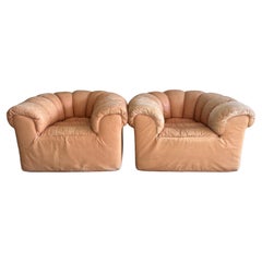 Pair of tan leather Dutch croissant puffy low lounge chairs