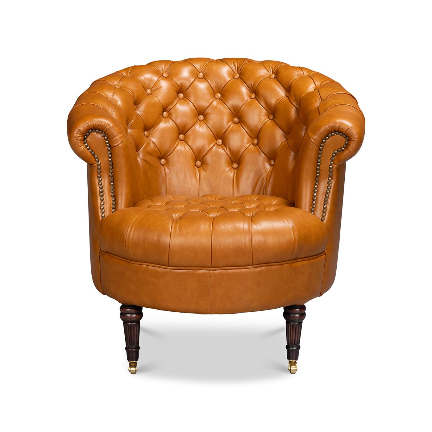 Upholstered in rich, top-grain Tan Brown leather, its elegantly curved barrel back is adorned with deep button tufting, exuding timeless sophistication.

Set on turned, tapered, and fluted legs, this chair is as functional as it is beautiful. Brass