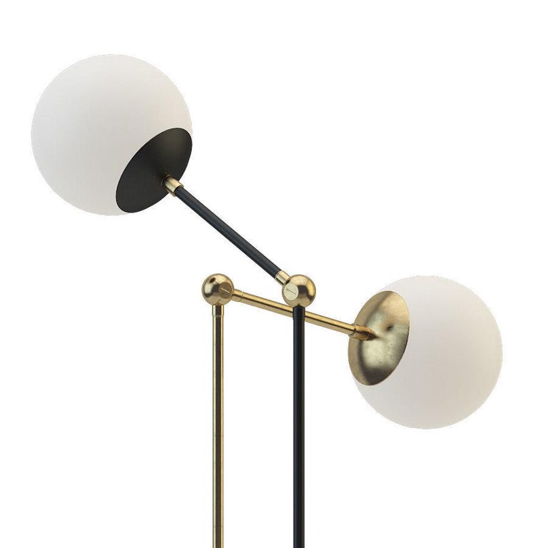 Pair of tango table lamps by Paul Matter
Brushed brass with brushed brass details. Etched glass globes.
Also available in blackened brass with brushed brass details.
Dimensions: H 30