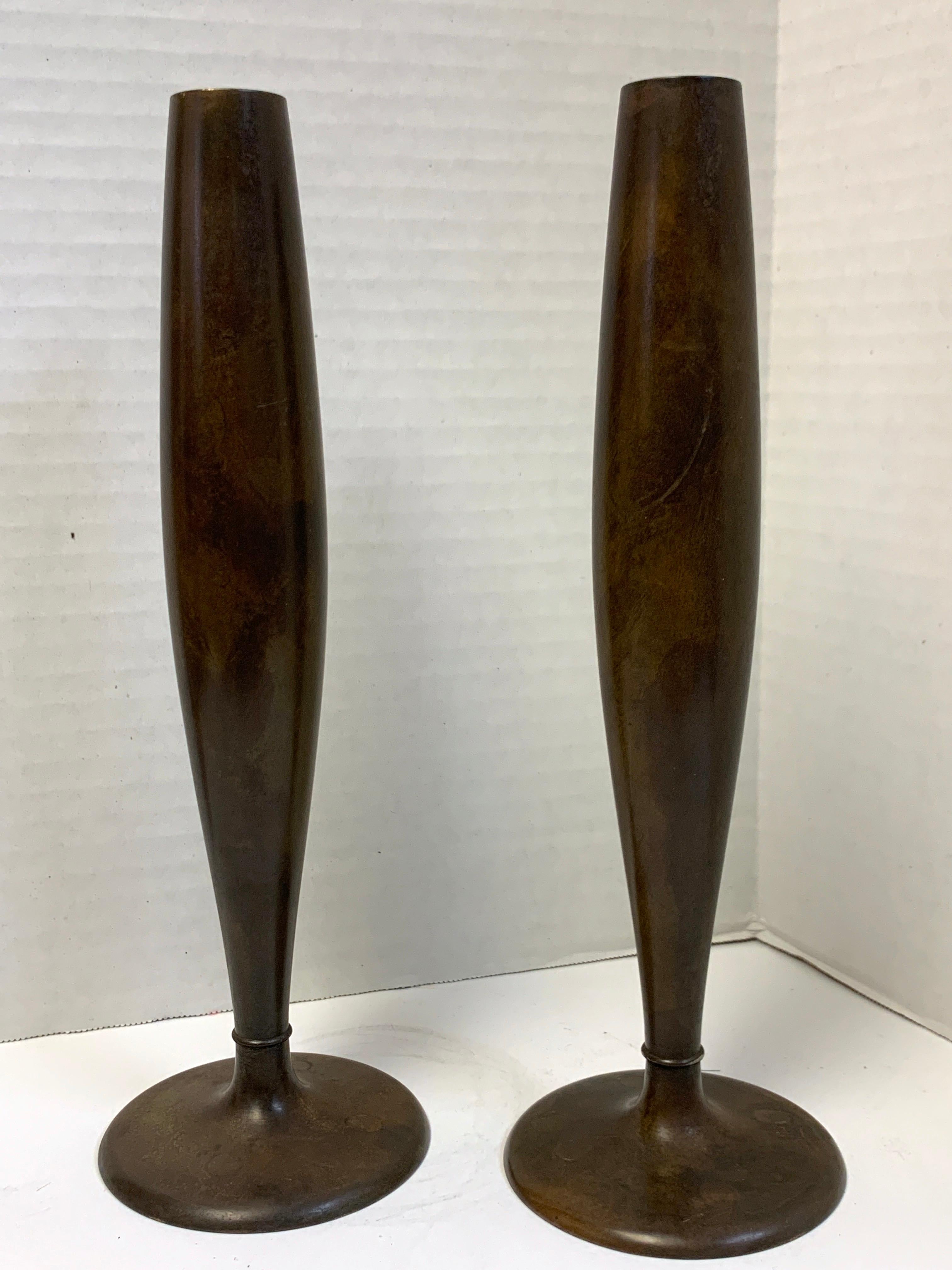 Pair of tapered bronze vases, by Tiffany Studios, New York, each one stamped Tiffany Studios, New York.