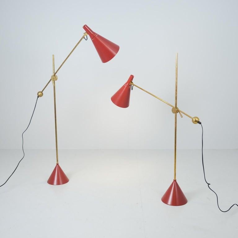 Pair of Tapio Wirkkala Adjustable Floor Lamps Model K10-11 in Red, Idman 1950s Moderno de mediados de siglo en venta