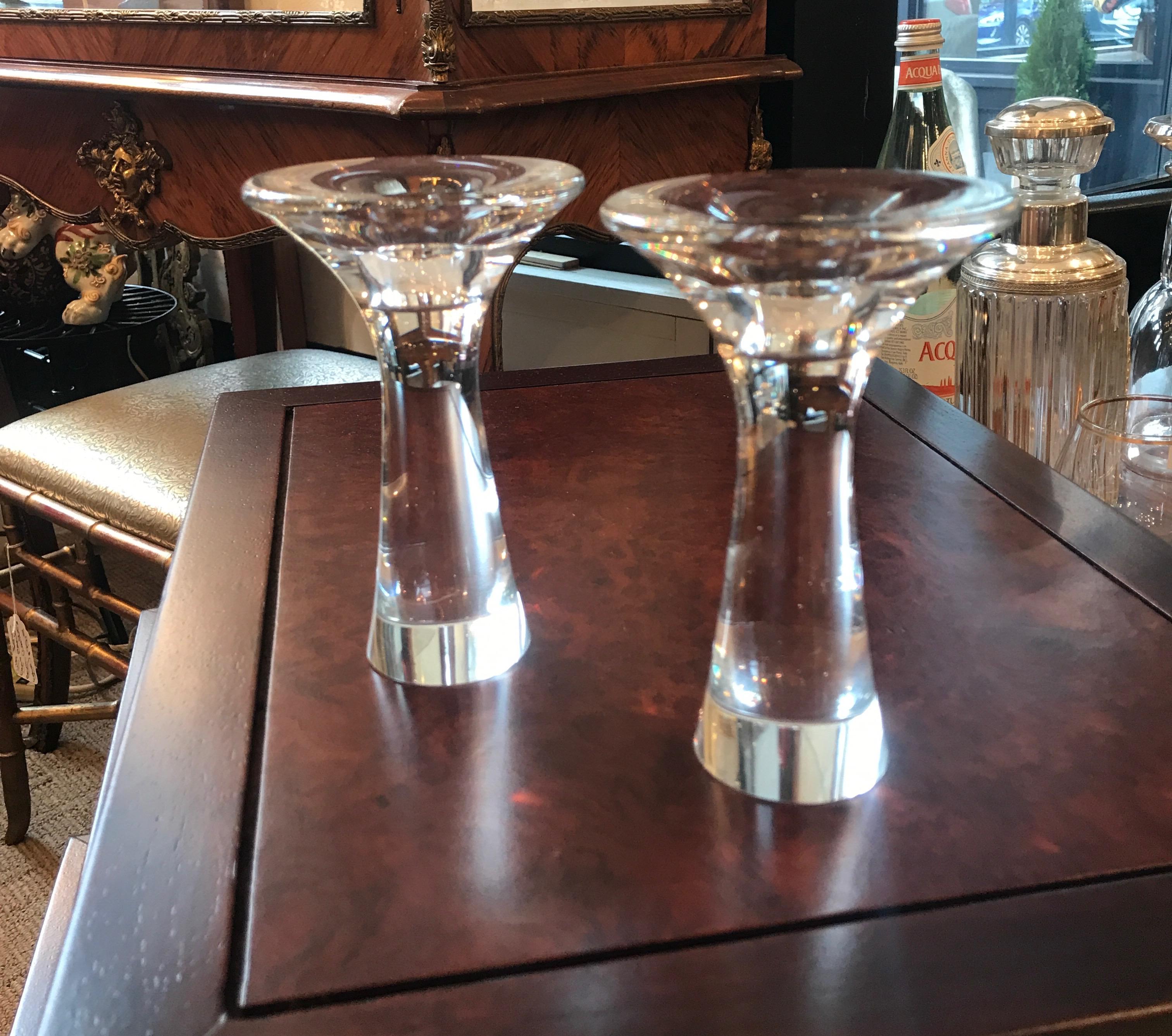These 2 glass candlesticks are designed by Tapio Wirkkala is called Model 3412.
The object is a Classic manufactured by the Finnish workshop Iittala. The pieces is from the 1960s and signed on the bottom 