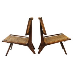 Pair of Teak and Rattan Lounge Chairs Attr. Paul László for Glenn California