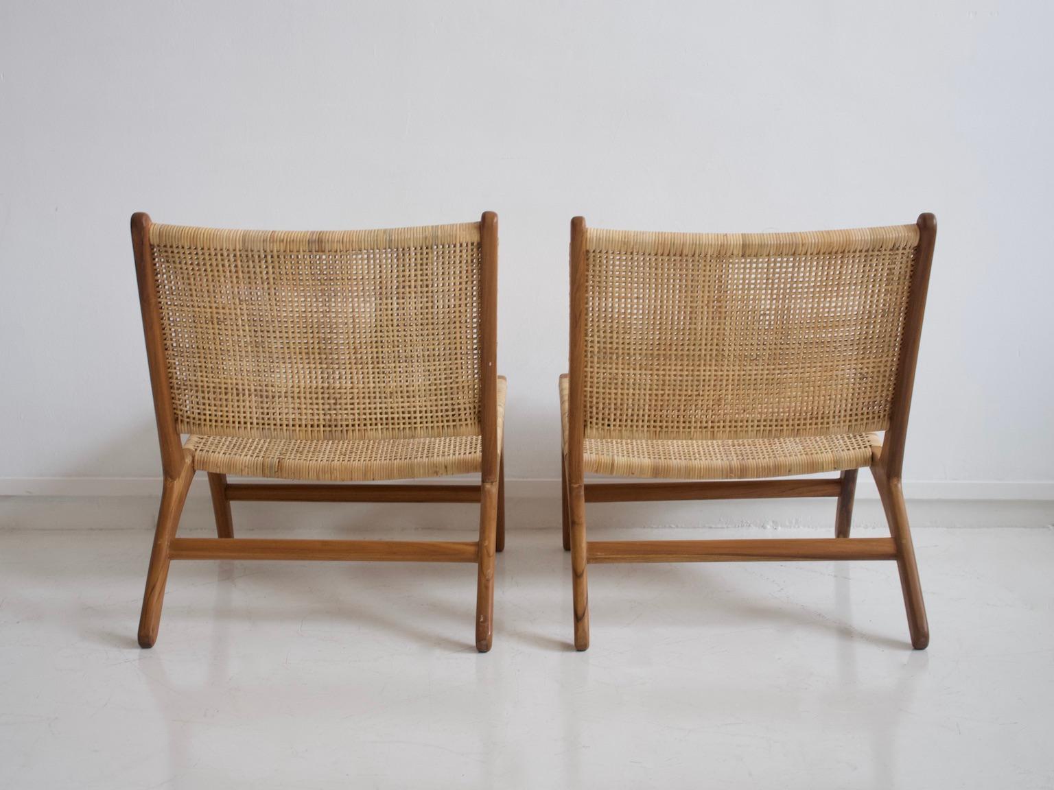 Pair of Teak and Rattan Lounge Chairs 1