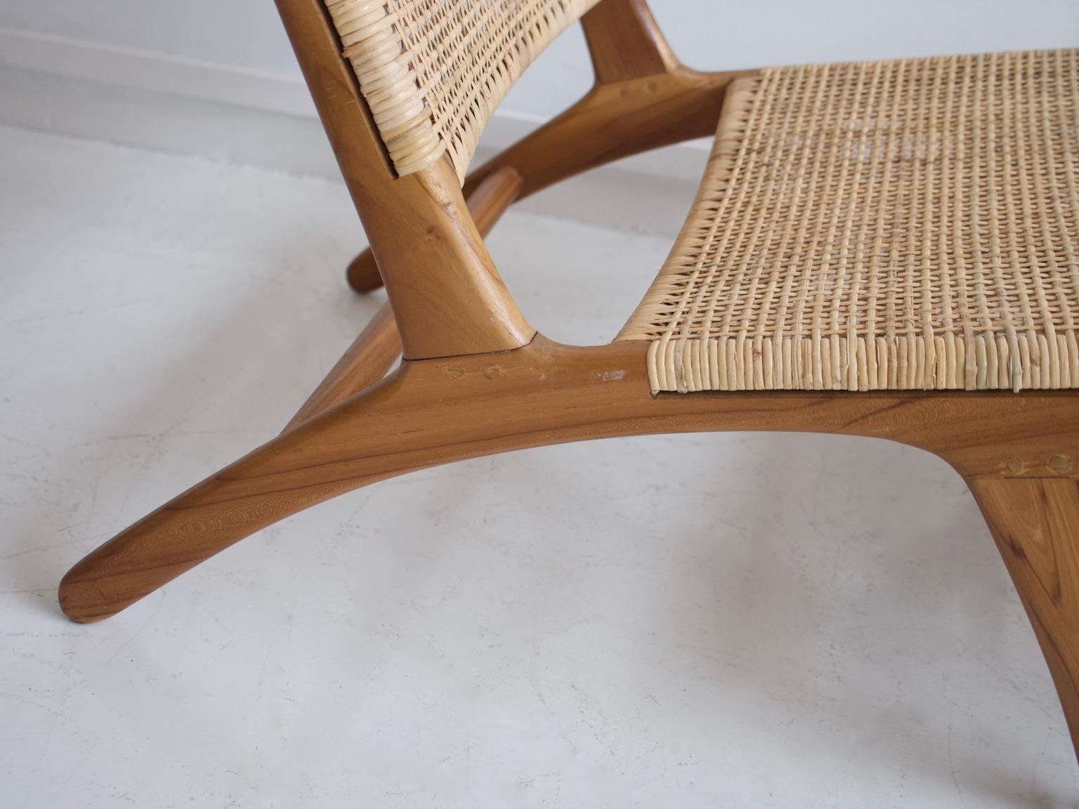 teak and rattan armchair