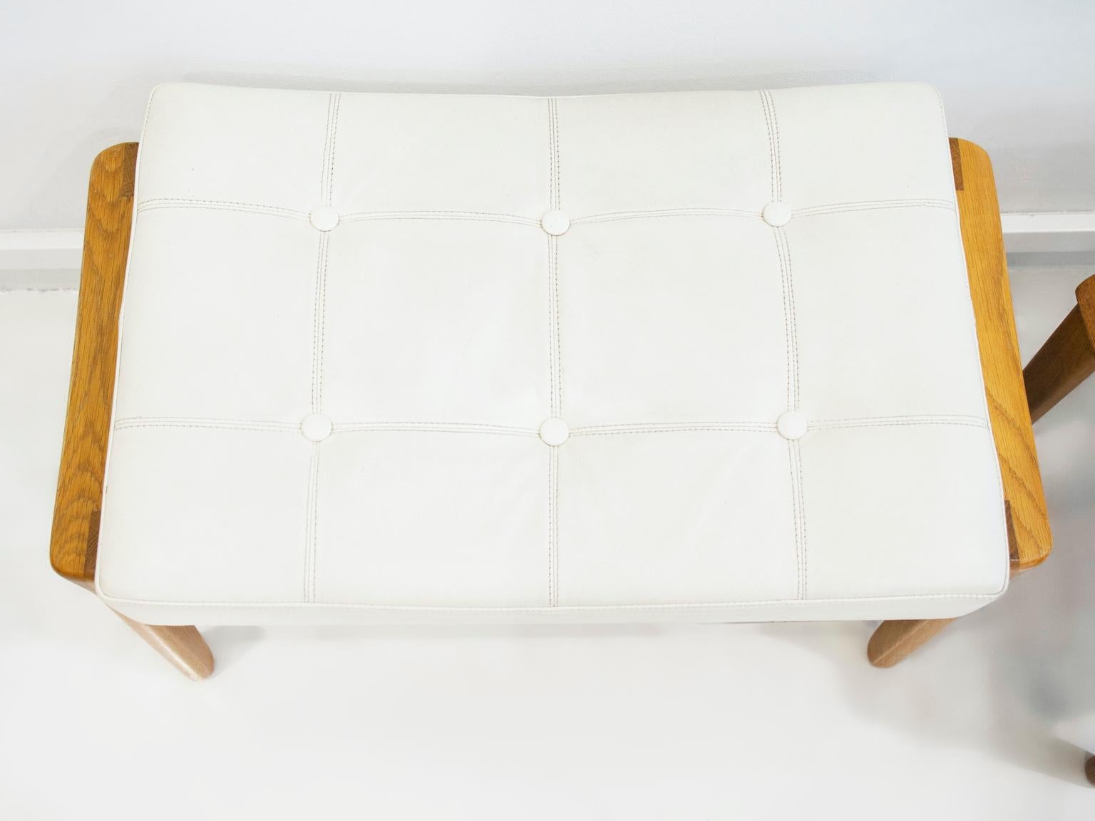 Pair of Teak and White Leather Upholstered Ottomans For Sale 2