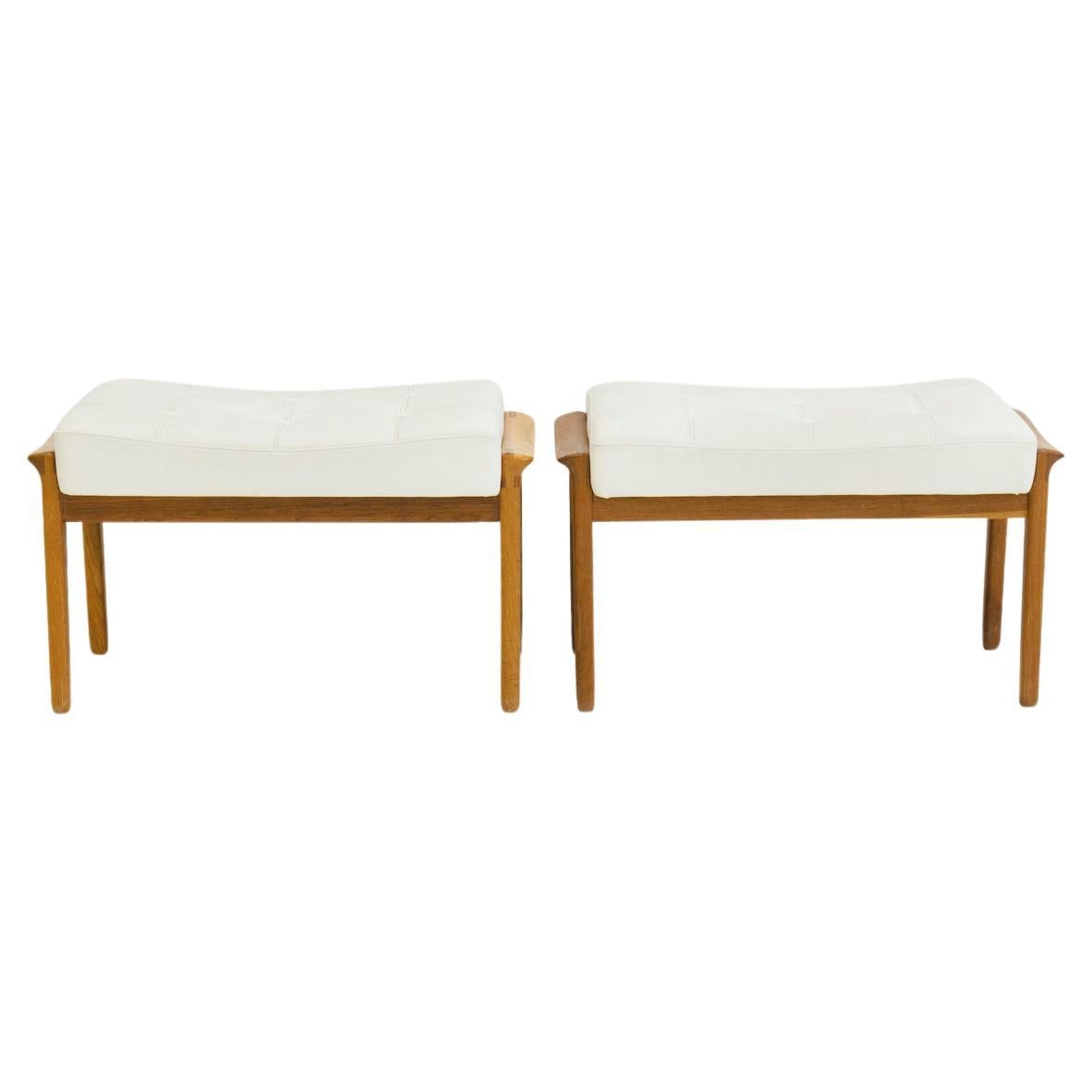 Pair of Teak and White Leather Upholstered Ottomans For Sale