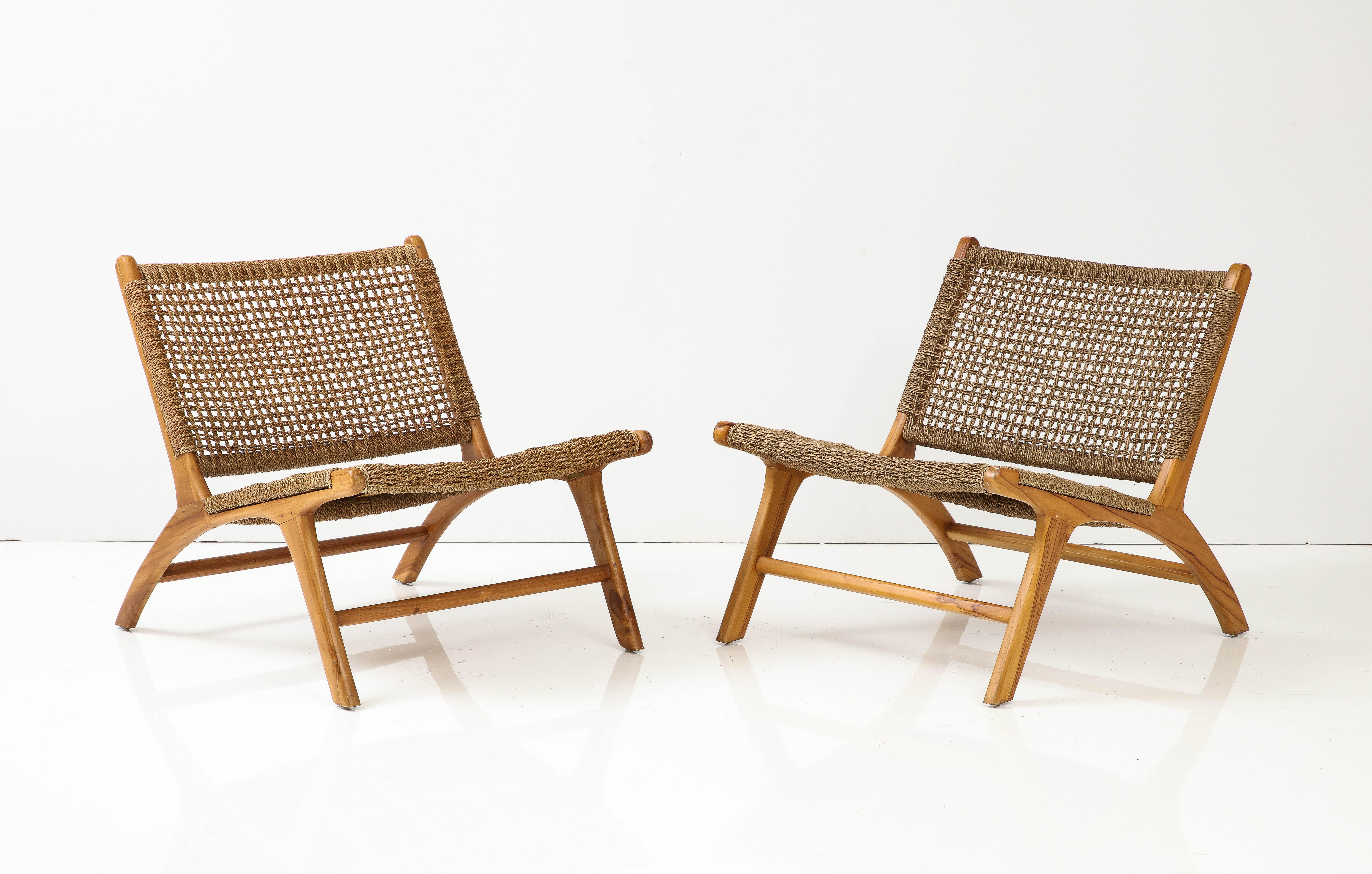 Pair of Organic Modern Schrijver chairs, signed, numbered.