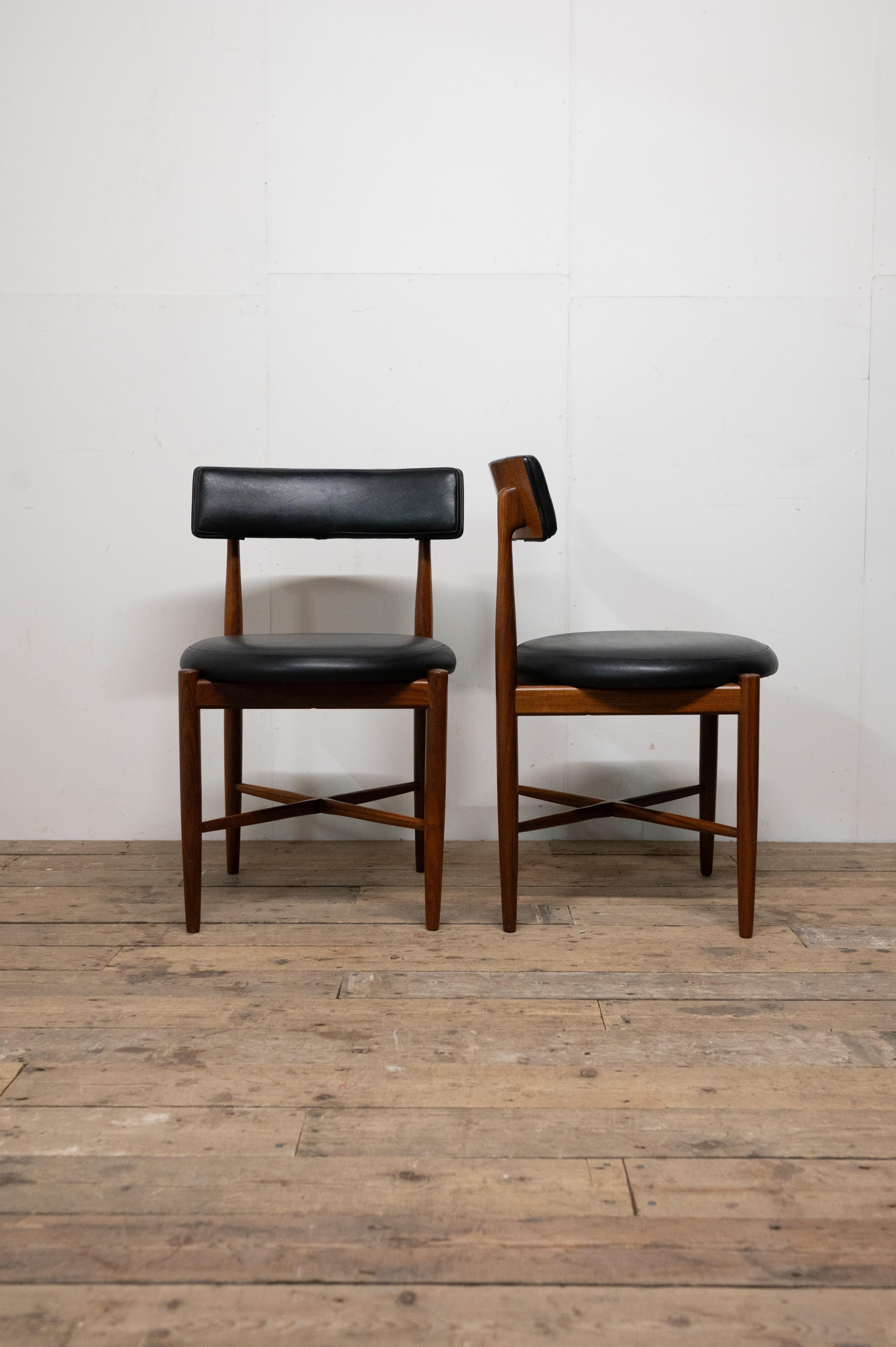 Introduce a touch of mid-century elegance to your dining space with this remarkable pair of Teak Dining Chairs by V. Wilkins for G Plan, featuring original upholstery in excellent condition.

These chairs are a testament to both style and comfort.