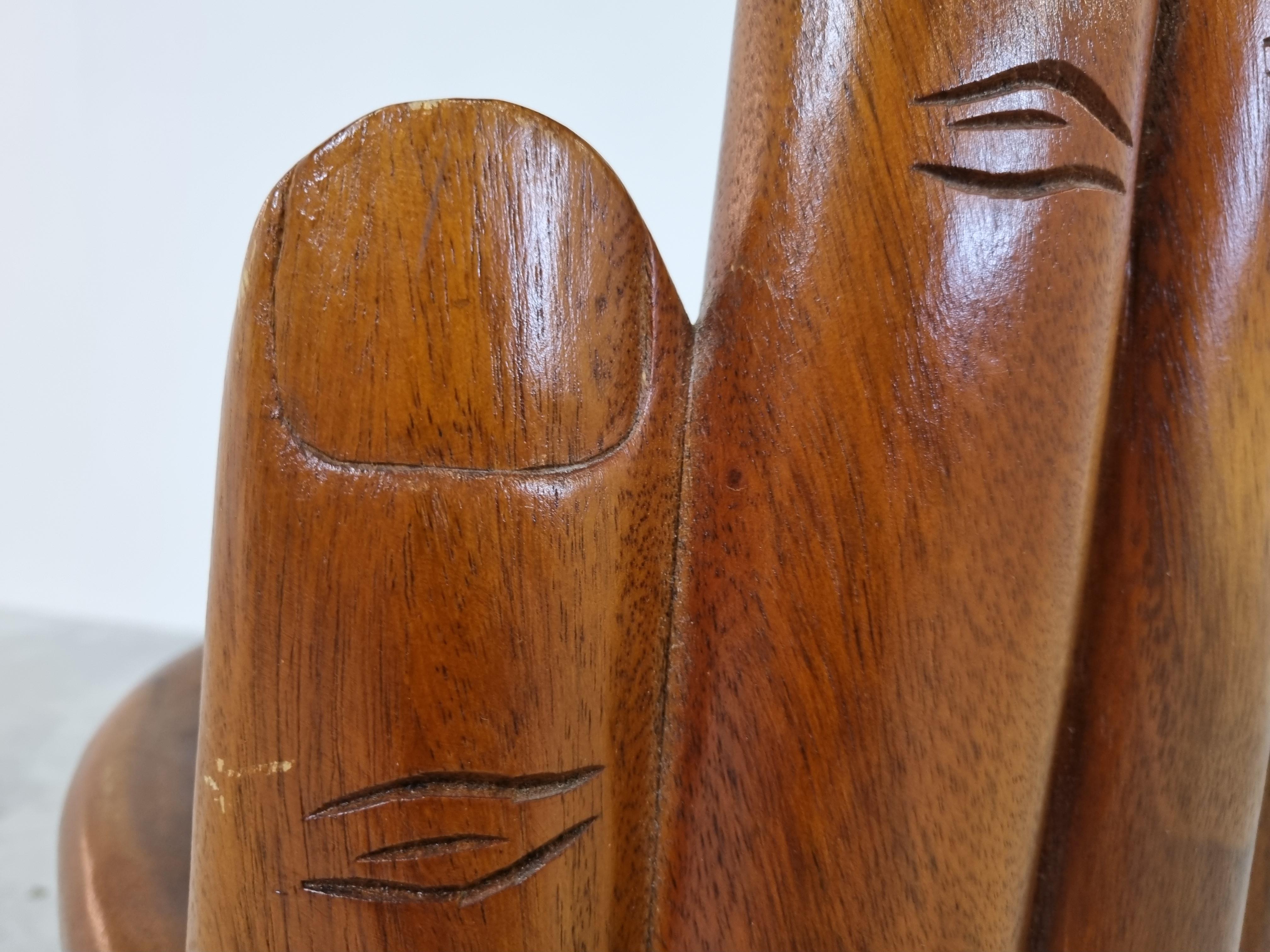 Vintage solid teak wooden sculpted hand chairs.

Beautifully made chairs, one chair has also wood carvings in it.

Very decorative as a pair.

1970s - Asia

Good overall condition

Dimensions:
Height: 93cm/36.61