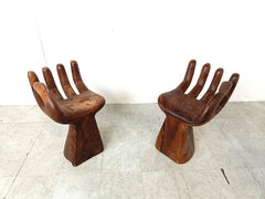 Pair of teak hand shaped chairs, 1970s