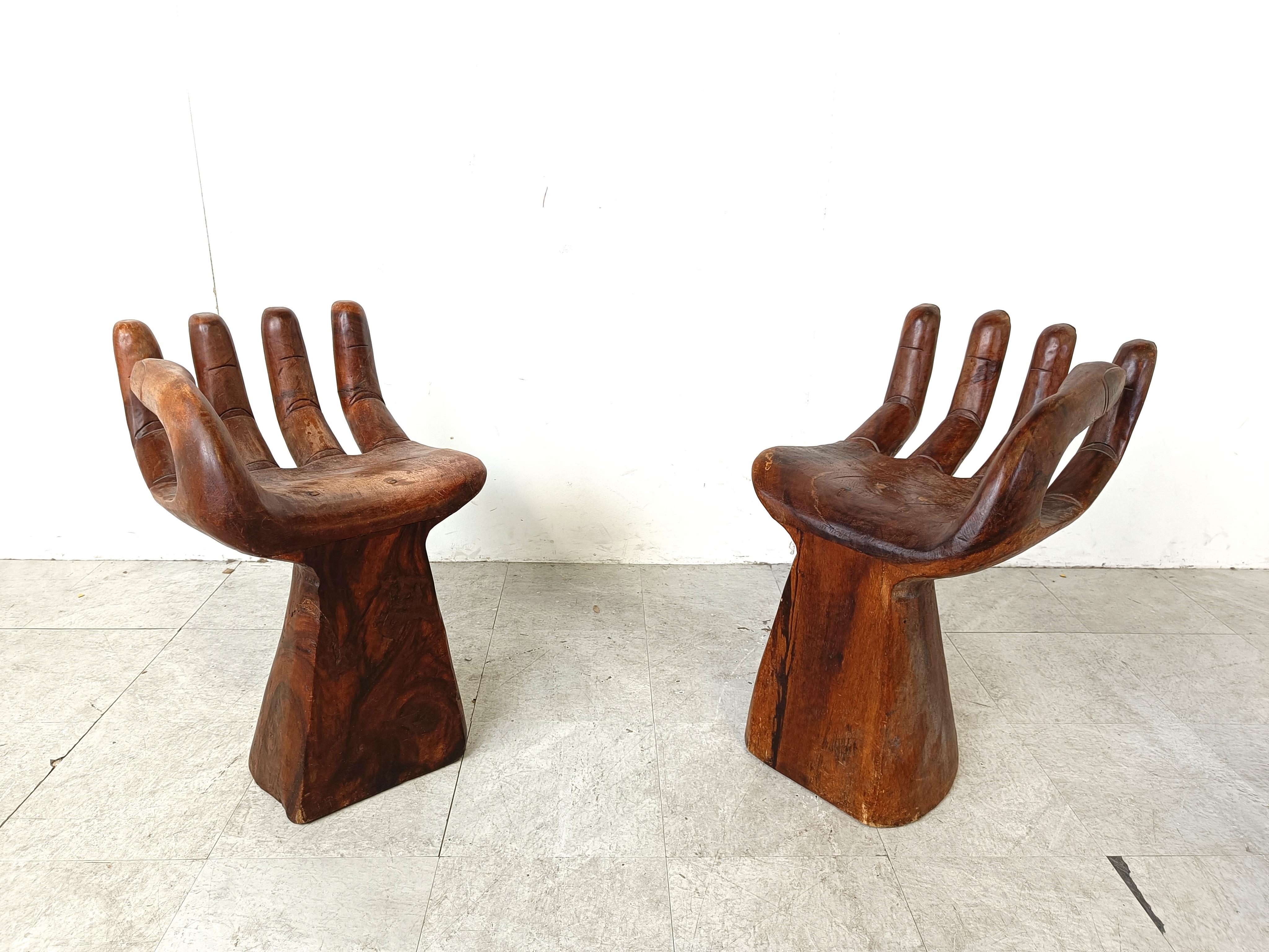 Post-Modern Pair of teak hand shaped chairs, 1970s For Sale