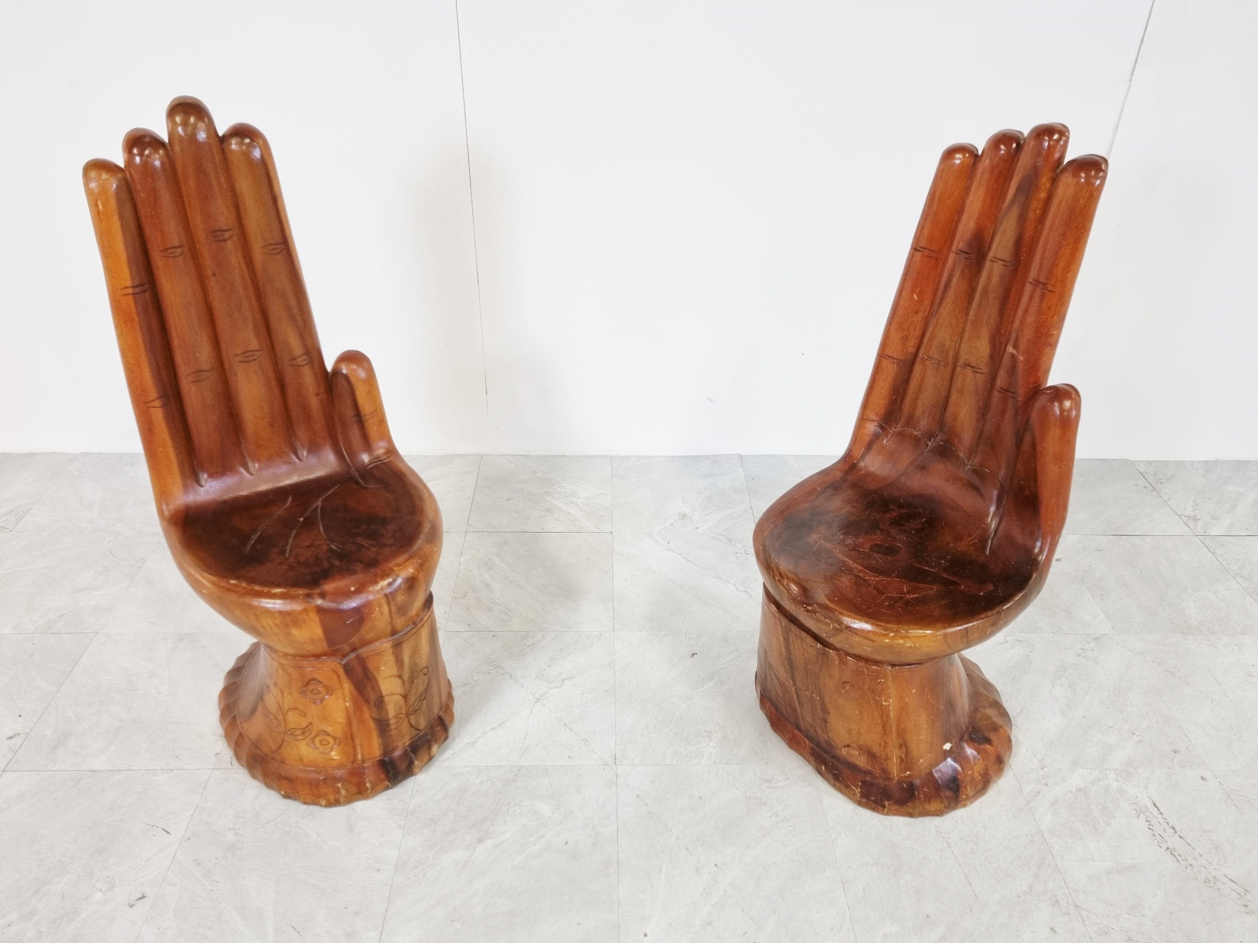 Indonesian Pair of Teak Hand Shaped Chairs, 1970s