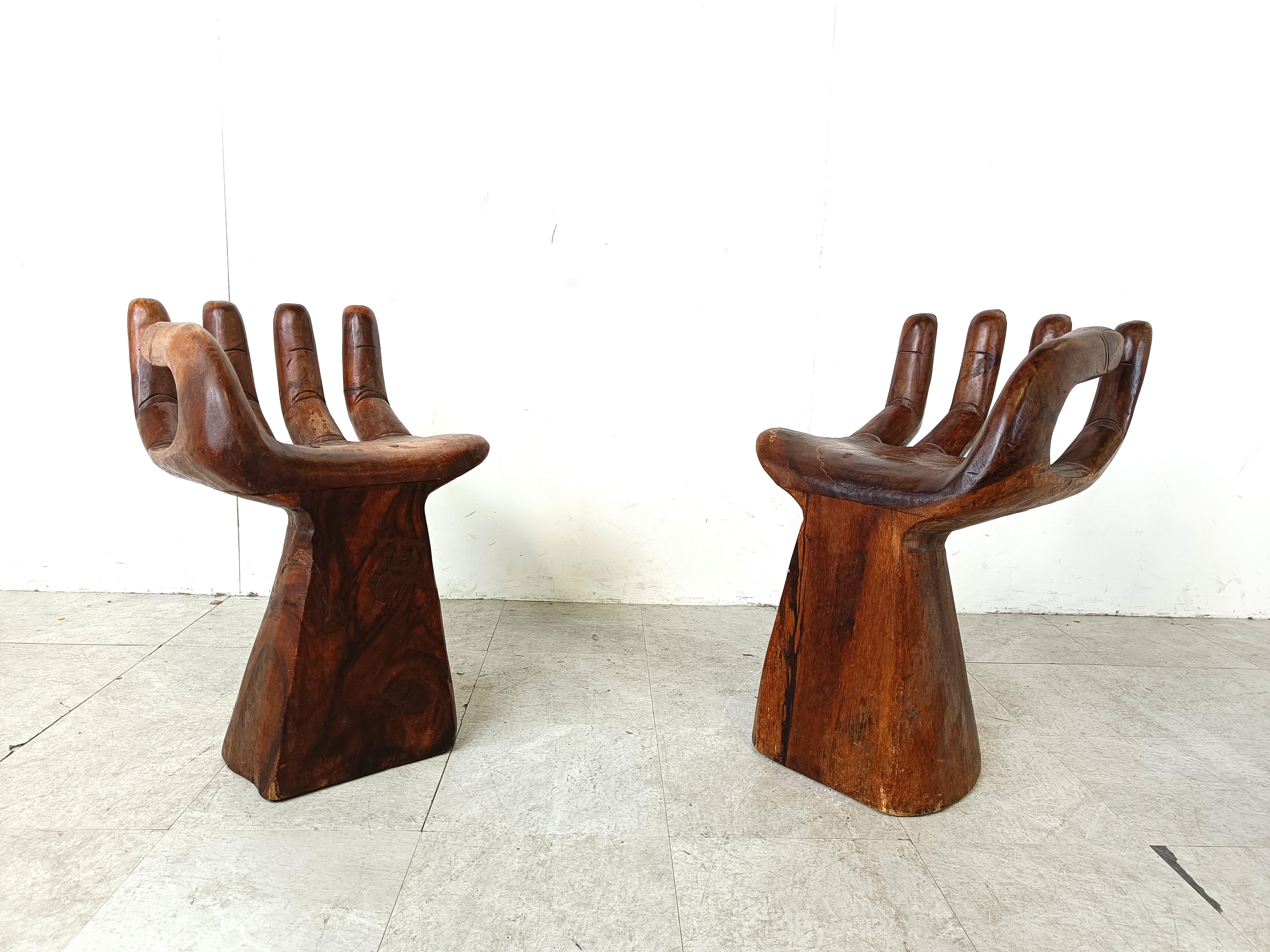Thai Pair of teak hand shaped chairs, 1970s For Sale
