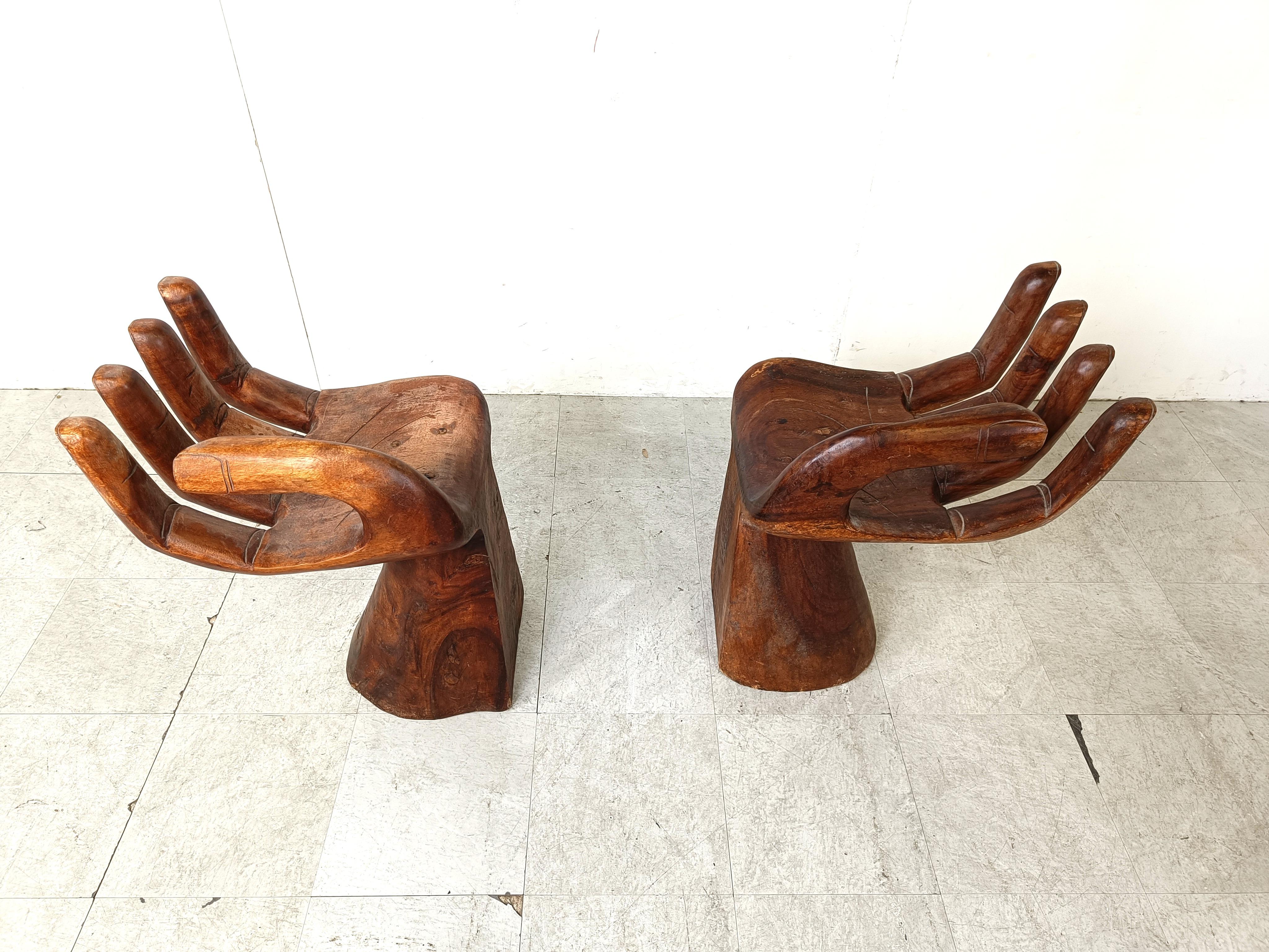 Pair of teak hand shaped chairs, 1970s For Sale 1