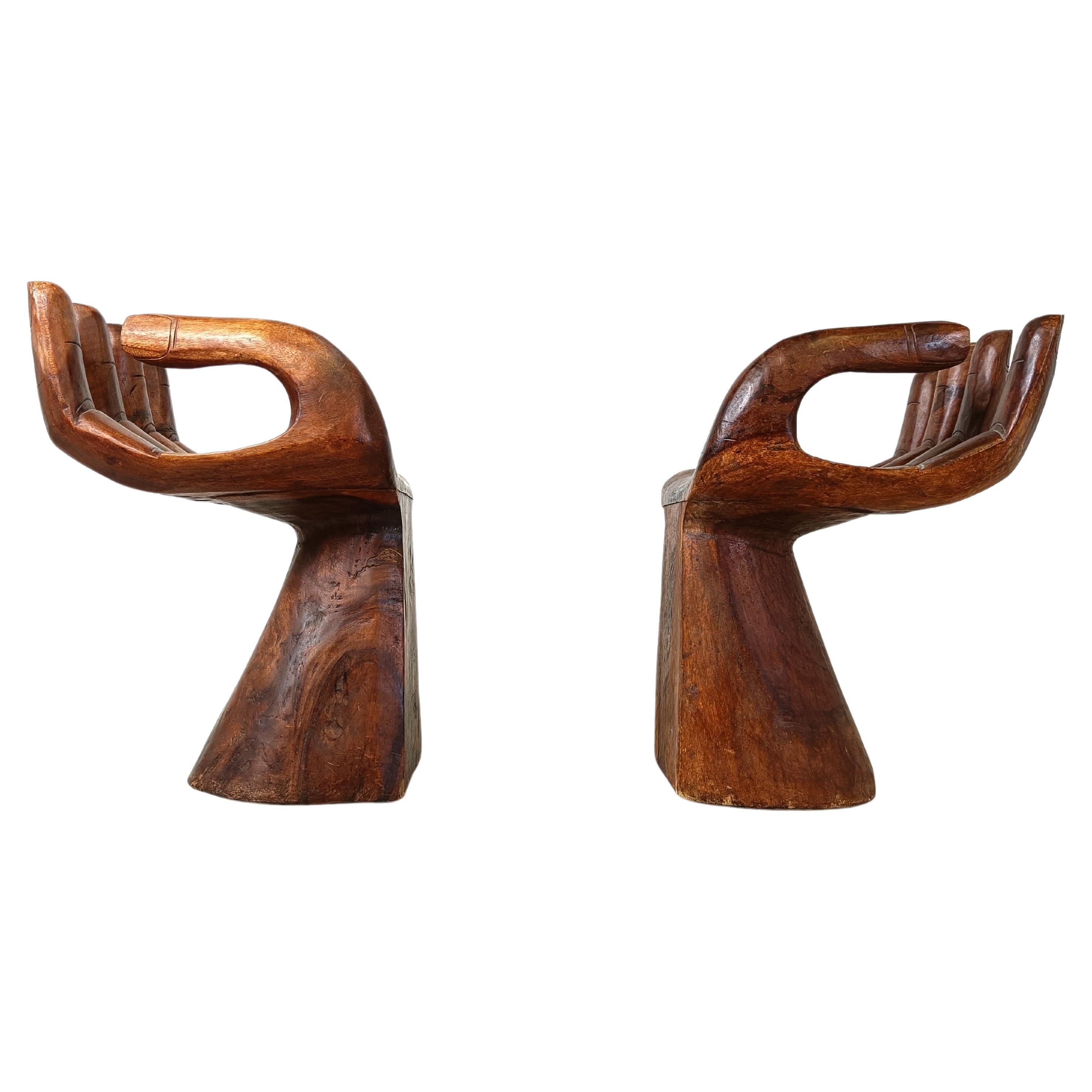 Pair of teak hand shaped chairs, 1970s For Sale