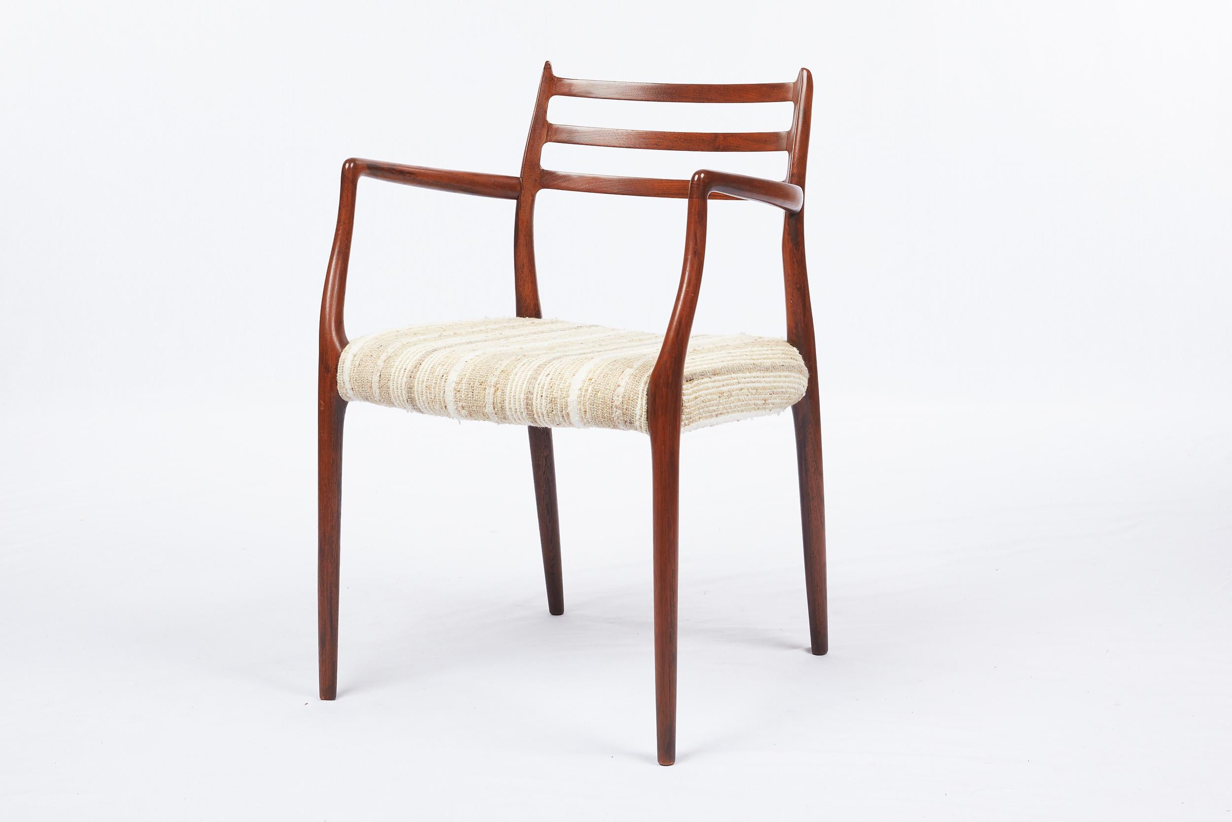 Paire de fauteuils en teck Niels Moller Modèle 62 Conçu en 1962 et produit par J. L. Moller Mobelfabrik.