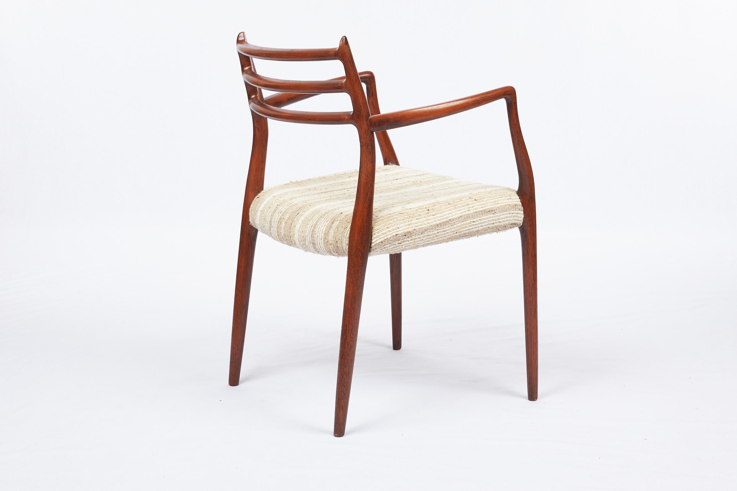 Tissu Niels Moller paire de fauteuils en teck modèle 62 en vente