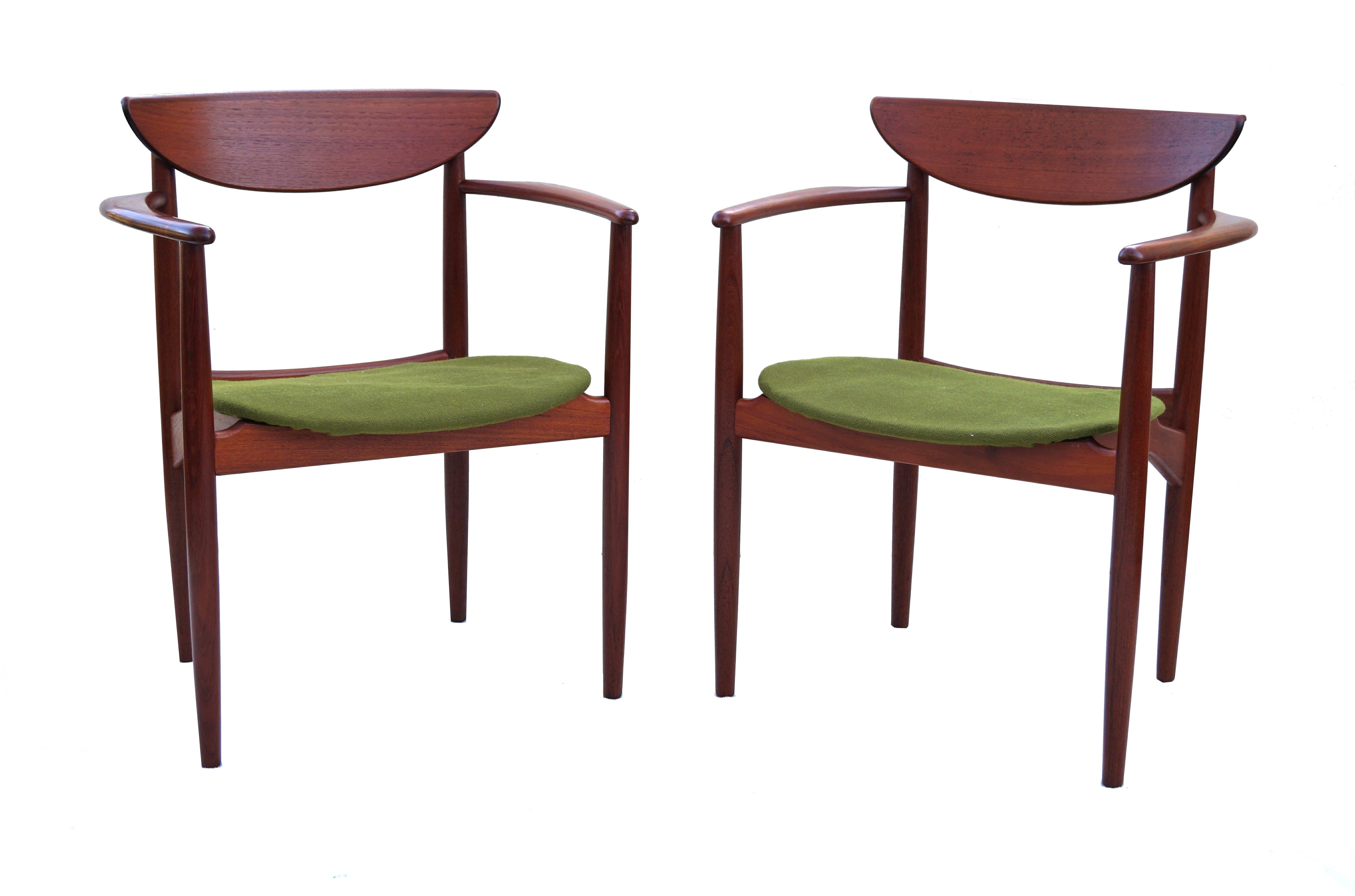The price listed is for the pair. Pair of Teak Scandinavian Modern Sculptural Peter Hvidt Side Arm Lounge Chairs. Seats are matching in color, but taken in different lighting. Some glare to wood on photos.