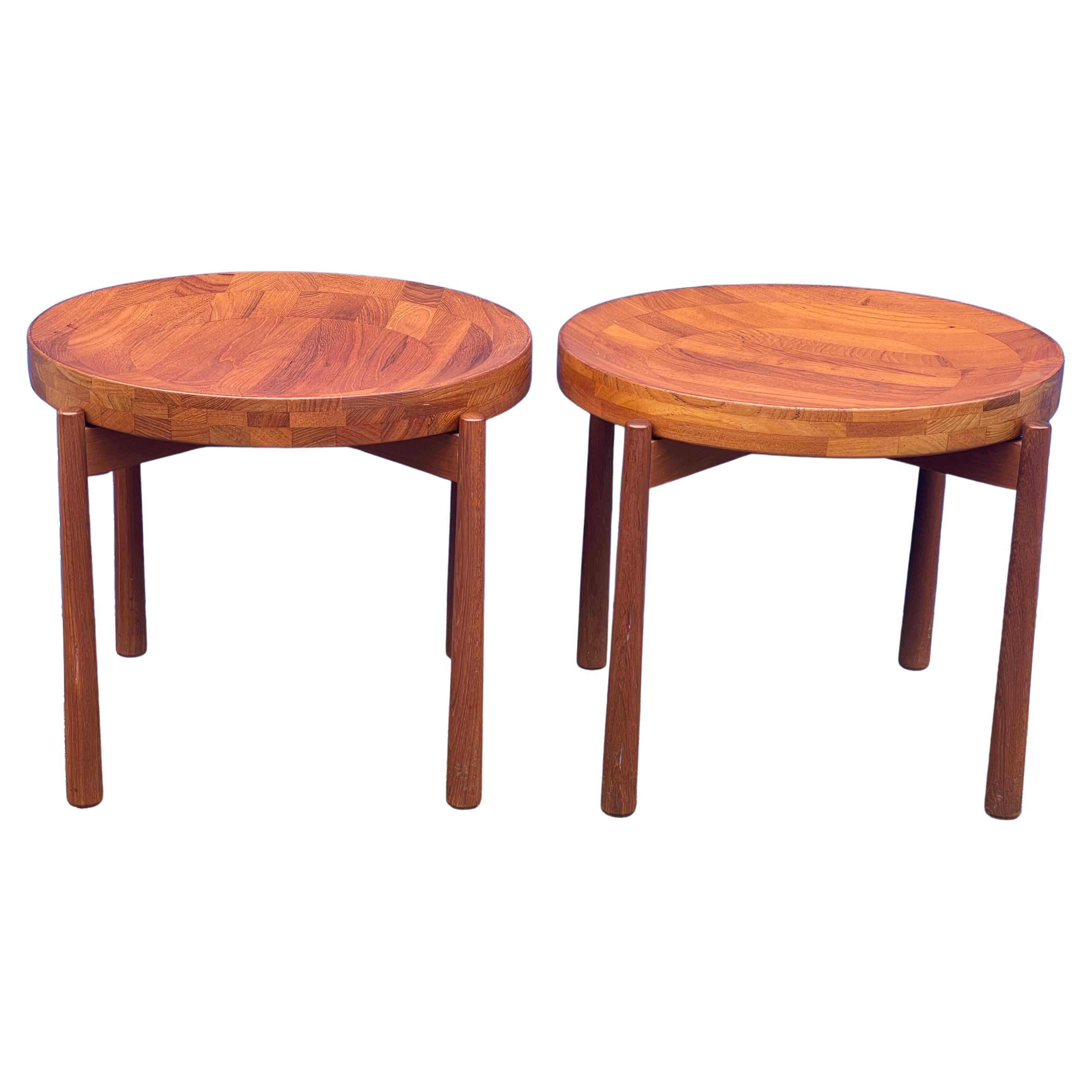 Gorgeous pair of staved teak tray side tables attributed to Jens Harald Quistgaard for DUX of Sweden, circa 1960s. The tables have a removable concaved top that can be used as a tray or fruit bowl. The top can be turned over to the flat side to