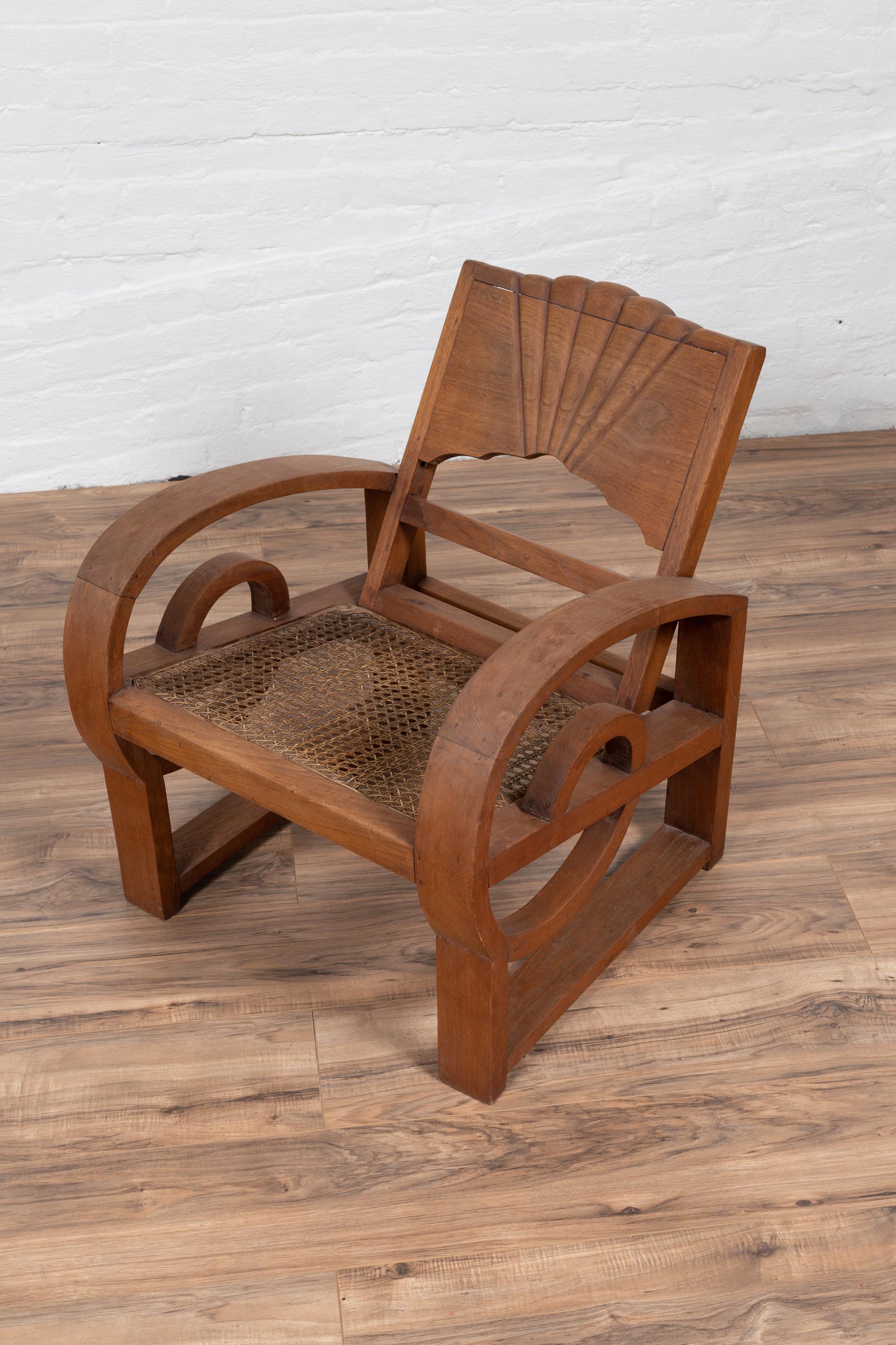 Pair of Teak Wood Country Chairs from Madura with Rattan Seats and Looping Arms 4