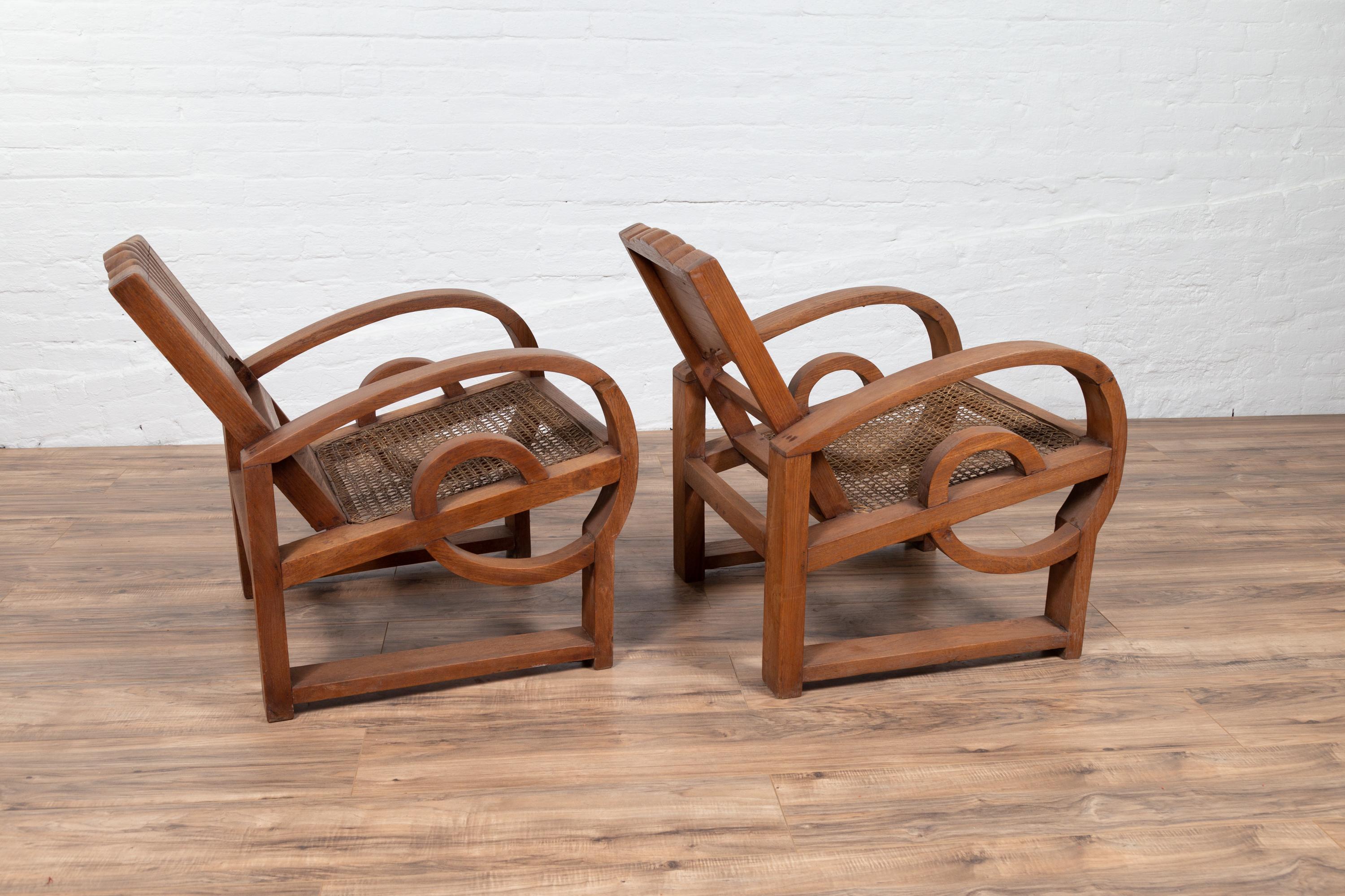 Pair of Teak Wood Country Chairs from Madura with Rattan Seats and Looping Arms 5